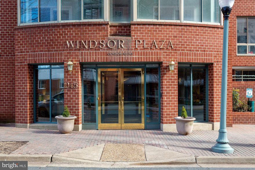 Live the relaxed and convenient life at this Ballston charmer in sought-after Windsor Plaza!  Beautifully updated two bedroom / two full bathroom end unit (more windows!) condo with hardwood floors, granite countertops, stainless steel appliances, gas fireplace, in-unit washer & dryer, beautiful window shutters, and fresh paint! A pleasing glass enclosed sunroom can be your much needed office with views of N. Utah St. Garage parking space (#150) and extra storage too!  HVAC and Washer/Dryer are new as of 2017!  Nothing to do here but move in!  The building has an outdoor pool for summertime fun with your friends and fellow neighbors.  An excellent, yet quiet, location on a dead end street mere steps to METRO (Orange/Silver Lines), shops, restaurants, watering holes, parks, trails, and transportation corridors.  This is Arlington.  This is you!