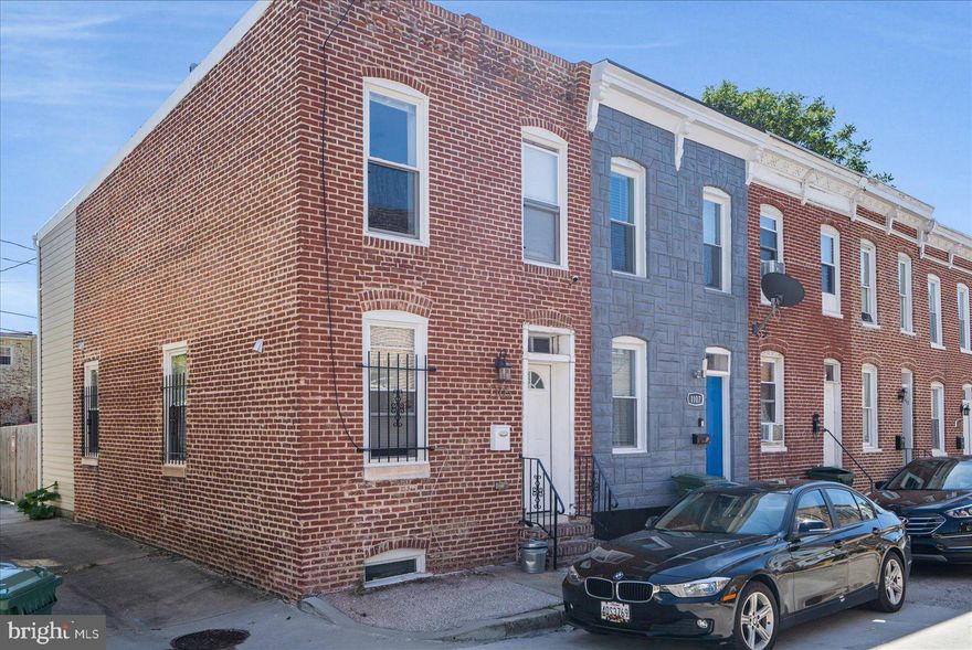 Charming  2 Bedroom 1.5 Bathroom Rowhome In Pigtown/Washington Village! The Main Level Of This Home Offers A Living Room, Dining Room/ Kitchen Combination With Stainless Steel Appliances, Granite Countertops, & Breakfast Bar With Hardwood Flooring Throughout. Continuing Through The Main Level We Have A Half Bath, & Access To Fenced Rear Yard-Potential Off Street Parking! The Upper Level Includes 2 Spacious Bedrooms With Ample Closet Space & 1 Full Bathroom. The Lower Level Offers A Laundry Room & Partially Unfinished Basement Perfect For Additional Storage Space. This Home Is Located Approximately 4 Blocks From The M&T Stadium, Orioles Park, Camden Yards, & Within Walking Distance To Baltimore's Inner Harbor!Roof(2021), & 1 Year Home Warranty.