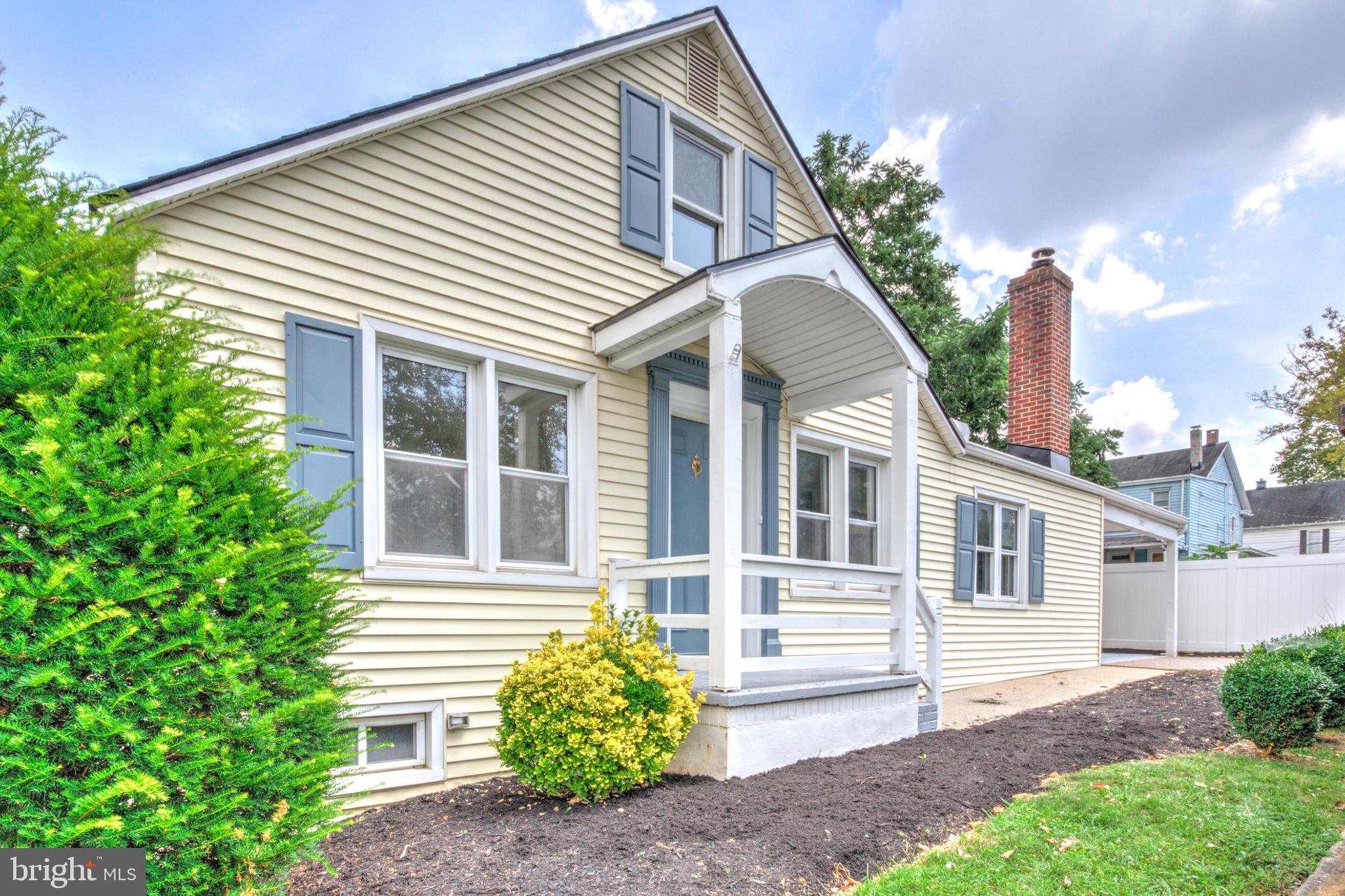 Welcome to this fully renovated 4-bedroom, 1.5-bath single-family home located in the community of Penbrook, just east of Harrisburg. With traditional siding and shutters and a stately covered front porch, the home blends classic charm with modern updates! The flat, fully fenced yard offers plenty of usable outdoor space, complete with a deck for entertaining and a carport for covered parking. Inside, the flexible main floor layout includes a dedicated living room with gleaming hardwood floors, a cozy family room warmed by a charming wood stove, a dining area, and great flow into the brand new kitchen! Featuring many desirable upgrades, the kitchen is outfitted with white cabinetry, quartz countertops, stainless steel appliances, and a stylish tile backsplash. Two bright bedrooms on the first floor feature refinished hardwoods and upstairs you'll find two additional well-sized and comfortable bedrooms offering plenty of space. A brand new full bath on the main floor services the bedrooms with a tub/shower combination and lovely beadboard detailing. A convenient first-floor laundry area and additional half bath for guests add to the functionality of the home. The clean, unfinished basement provides ample room for storage, along with an attached storage/hobby room off the carport and an additional shed. Enjoy peace of mind with brand new, efficient HVAC to keep you cool this summer! This move-in ready home offers space, updates, and value in a well-established neighborhood close to city amenities - schedule a showing today!