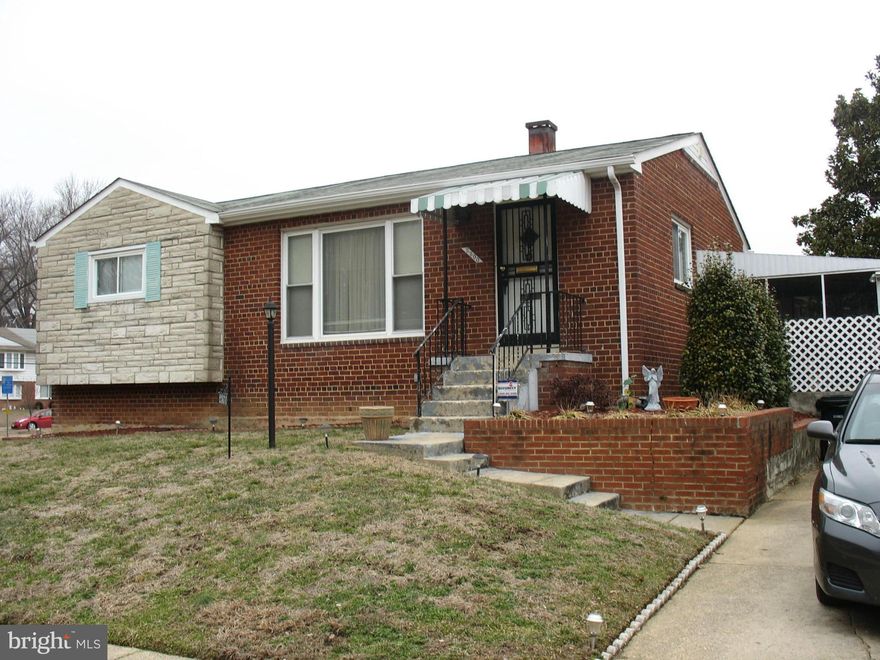 Enjoy this detached brick rambler located on a corner lot in a quiet neighborhood, renovated kitchen and bath, new appliances, hardwood floors, large basement, screen in porch and new gutters.  Home Warranty being provided by Seller.  Near public transportation (bus and metro), shops, and access to major highways. Seller is very motivated.   NO SIGN ON PROPERTY