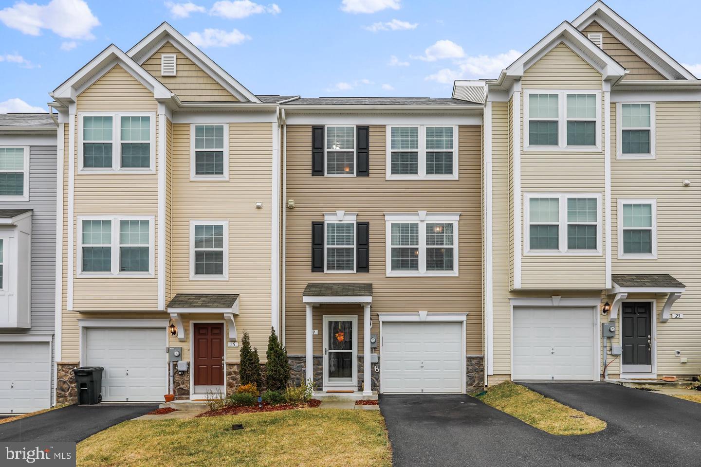 Welcome to this nearly Brand New home in the desirable Stonebrook Village community in Hedgesville!
This stunning 3-level townhome features approximately 2,000 square feet of living space, a fully finished walkout basement, and a 1-car covered garage plus an open car parking on the driveway. With 3 bedrooms and 4 bathrooms (2 full baths and 2 half baths), this townhome has plenty of space for everyone. The first level offers a laundry room and a versatile walkout basement that could be used as a 4th bedroom, flex room, office, or home gym. The second level boasts a spacious living room, a morning room, and an eat-in kitchen with upgraded quartz countertops, upgraded cabinets, a pantry, and plenty of table space. The third level features 3 bedrooms, including a primary bedroom with a walk-in closet and an en suite bathroom with double sinks, a soaking tub, and a stall shower. Enjoy a nice size backyard and the convenience of being close to shops, restaurants, and I-81. The home is also within walking distance of Hedgesville Elementary and Middle Schools, as well as Hedgesville High School. The tenant is responsible for all utilities and lawn care. A credit score of at least 620 and an income that is 3 times the rent are required. Pets are allowed on a case-by-case basis, with a $500 non-refundable fee per pet. Don't miss your chance to make this beautiful townhome your new home. Contact us today to schedule a viewing!