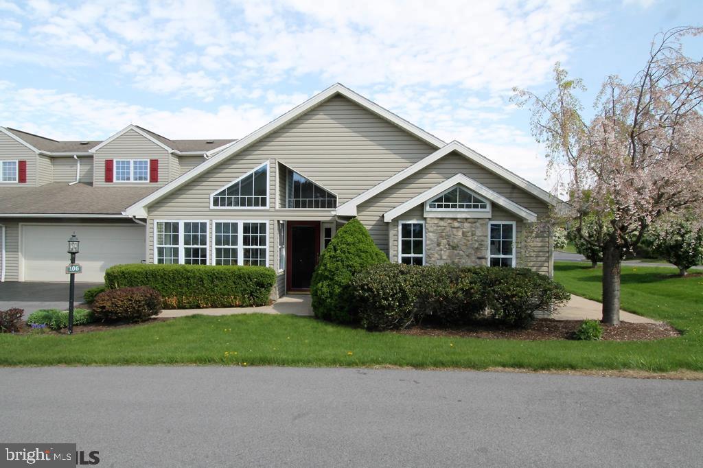 This beautiful 2 bedroom, 2.5 bath home in Wellington Greens is light, bright and waiting for you! Built in 1995, this home features an open floor plan with vaulted ceilings, built-in cabinets, gas fireplace and master bedroom with en suite. The living room has vaulted ceilings, a gas fireplace and leads to a side sitting porch. The expansive first floor master bedroom offers 2 walk-in closets, a sitting/reading area, and en suite with tub and shower. The laundry room is located on the first floor. On the second floor, enjoy a guest suite with large walk-in closet and full bathroom. Other highlights include central air, 2 car garage with extra storage area, beautifully maintained common grounds, clubhouse with meeting rooms, and community pool. This home is located close to downtown, PSU, bus routes and biking/hiking paths. Call today to arrange your private showing!