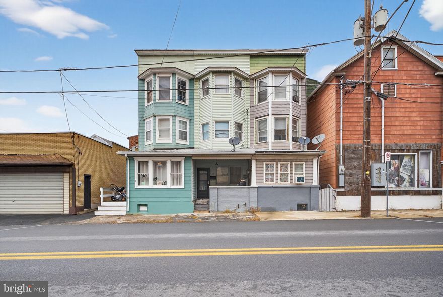 4-bedroom, 1-bath center-row home in Lansford ready for a full renovation. Perfect for investors—bring your vision and transform this property. Super low taxes make it a great opportunity for an owner-occupant or anyone looking to expand their portfolio. Features include a newer oil hot water boiler, a full basement for storage, a low-maintenance yard with a small covered patio, and a second-floor bedroom with a private balcony. Third level offers two additional bedrooms. Minutes from historic downtown Jim Thorpe, Mauch Chunk Lake, and seasonal activities. Call today!