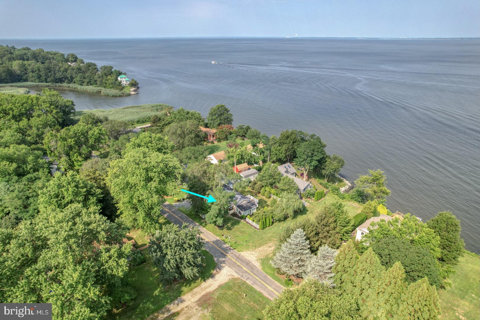 This 2 bedroom, 1-bath home offers a peaceful escape with views of the Chesapeake Bay. Nestled in Tolchester Estates community, the property is just a short stroll from Tolchester Marina, a boat ramp, and a sandy public beach—making it a perfect retreat for boating, beach going, or simply enjoying being close to the water. The home’s layout makes it an ideal weekend getaway or low-maintenance full-time residence. Wake up to water views. Conveniently located between Chestertown and Rock Hall, you're never far from shops, restaurants, and cultural events.