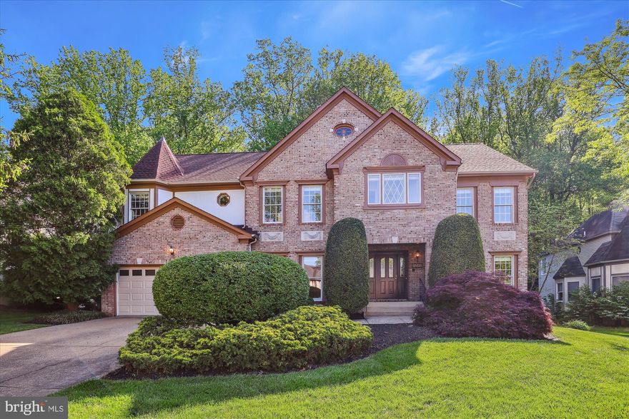 Don't miss out on this rare gem in the coveted Hampton Chase neighborhood! Welcome to luxury living at its finest with this stunning Grand Barrington model home. Crafted with exquisite brick and stucco Tudor style, this residence boasts over 5400 sq ft of living space on a serene cul-de-sac, nestled on a lush, park-like lot backing to trees.

Step inside to discover a spacious floor plan featuring 4 bedrooms, 3 and a half baths, and an array of upscale amenities. The gourmet eat-in kitchen is a chef's delight, complete with stainless steel appliances, granite countertops, wall ovens, a large island, gas cooktop, and a convenient microwave.

Entertain guests or enjoy quiet evenings in the two-story family room, adorned with a beautiful wall of windows that flood the space with natural light. Extend your living space outdoors to the expansive rear deck, perfect for al fresco dining or simply soaking in the serene surroundings.

Work from home in style with a spacious private office featuring custom-built ins, while the finished basement offers additional living space ideal for a home theater, game room, or exercise or childrens play area . A bonus room to be used as an office, den or even guest room and a full bath in the basement provide versatility and convenience.

Retreat to the upper level where the primary owner's suite awaits, boasting a tranquil sitting area, large walk-in closet, cedar closet, and a spa-like bath with double sinks, soaking tub, and separate shower. Three additional generously sized bedrooms, one with an Ensuite bath and the others sharing a buddy bath, provide ample space for family and guests.

Conveniently located for commuters with easy access to Fairfax County Parkway, I-66, Route 29, Route 28, Route 50, and Braddock Road, this home offers the perfect blend of tranquility and accessibility. Close to shopping, dining, and top-rated schools, this is an opportunity not to be missed!