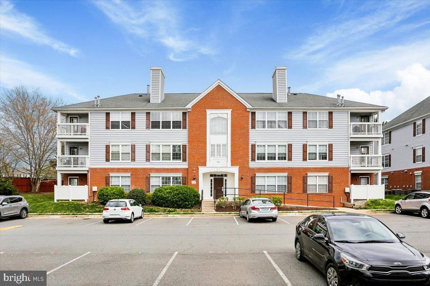 Located in the heart of the Town of Leesburg to all major routes and Dulles Greenway.  Brand new carpeting, fresh paint throughout and freshly cleaned 2 bedroom & 2 bathroom plus den condo backs to trees on ground level.  Sunny and bright kitchen with ceramic tile flooring, stainless steel dishwasher, gas range, built-in microwave, all overlooking the living room/dining room combination.  The dining area has service door opening onto the private fenced patio.  Split floor plan with bedrooms on opposite sides of condo.  The primary bedroom offers a large walk-in closet as well as en suite bathroom (large shower).  The second bedroom has generous closet space.  There is also a bonus den/office/3rd bedroom with glass French door.  Assigned parking space 171 with lots of visitor parking.  Condo is steps away from the community pool and club house.