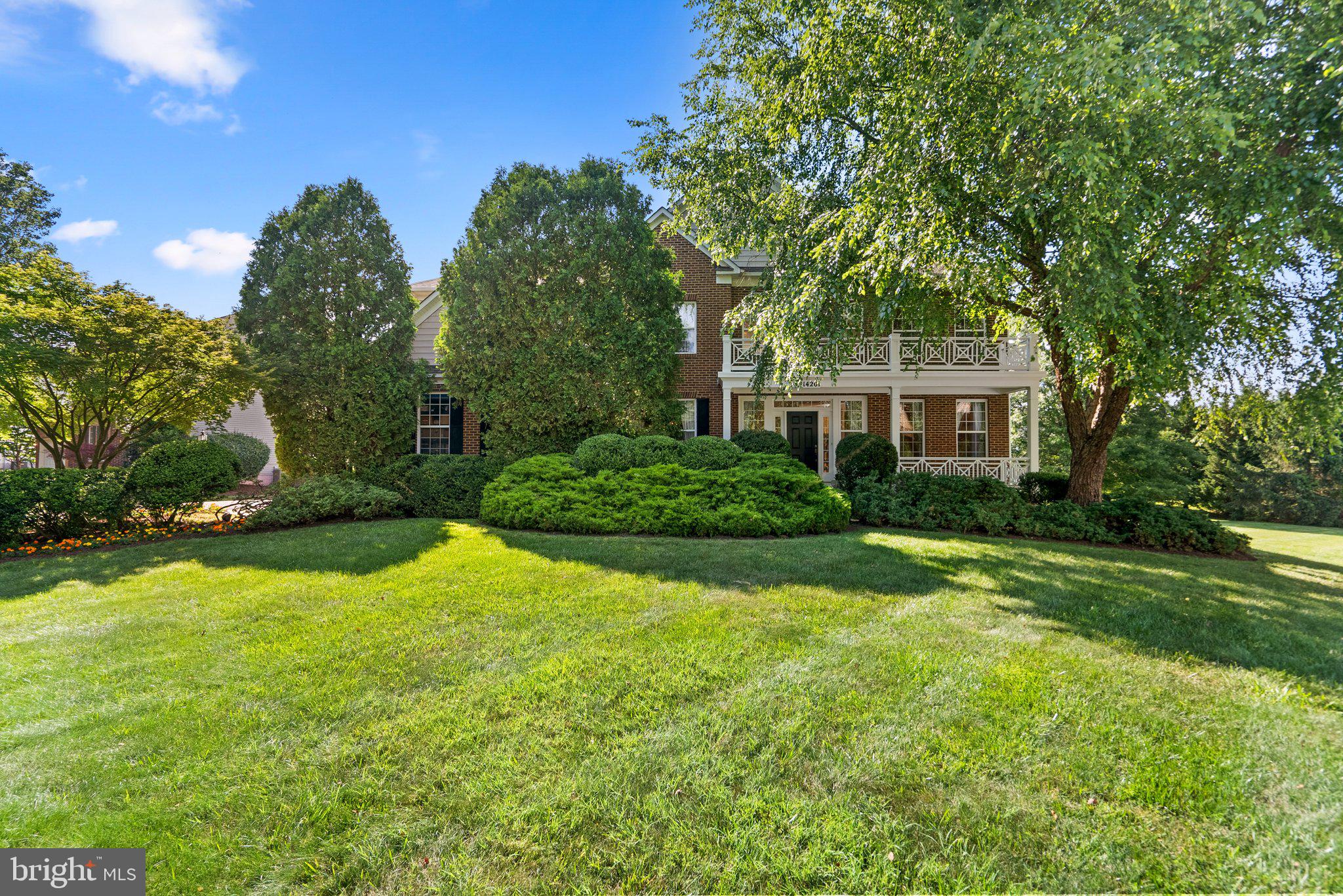 This impeccably maintained home exudes pride of ownership, boasting 5,600+ sq ft, a grand 2-story Foyer that sets the stage for the elegant entertaining spaces. The stunning Family Room features soaring ceilings, abundant natural light from sun-filled windows, and a charming wood burning fireplace. A private home office provides the perfect space for work or study. The chef's kitchen, complete with a center island and pantry, flows seamlessly into the adjoining Breakfast Room, offering access to a private Deck for outdoor enjoyment.
The Second Floor, accessible from both the main and side staircases, unveils a luxurious Primary Suite, featuring a tranquil Sitting Room, a private Balcony, 2 walk-in closets, and a luxury ensuite Bathroom. Three additional spacious Bedrooms and Two full Bathrooms provide comfort and privacy for guests or family members.
The fully Finished Walk-Out Lower Level presents an expansive Recreation Room with high ceilings, a 5th Bedroom, Full Bathroom, a second home office, and ample storage space, offering versatility and functionality for various lifestyle needs.