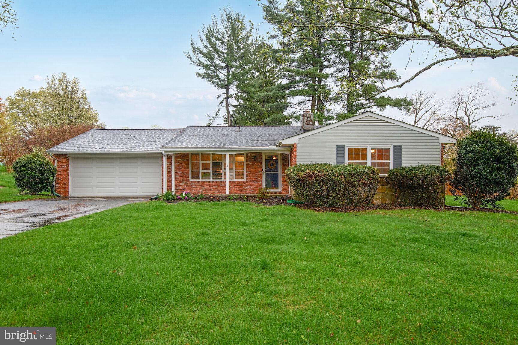 WOW!!! LOOK AT THIS NEW LOOOOOOW PRICE! Are you dreaming of living in an established neighborhood with wide tree lined streets, large lots, mature landscaped yards, excellent community spirit, close to nature yet also minutes from parks, restaurants, shopping and major commuting routes? Your dream is about to come true here in Chestnut Hill Estates in this solid brick home with real hardwood floors, traditional floor plan offering 3 bedrooms on the main level, large kitchen, big windows with views of the large level lot shaded by mature trees, a charming stone patio off the dining room, lower level with a masonry fireplace, den in the lower level with a closet, tons of storage, and an over-sized two car garage. This home offers almost 3000 sq. ft. of space and is heated with toasty natural gas (full HVAC replacement approximately 3 years ago). The roof was replaced two years ago 2023. Brand new natural gas water heater 2025. New insulated garage door 2024. One year home warranty offered. Ready for the next lucky owner. They don't build homes like this anymore.