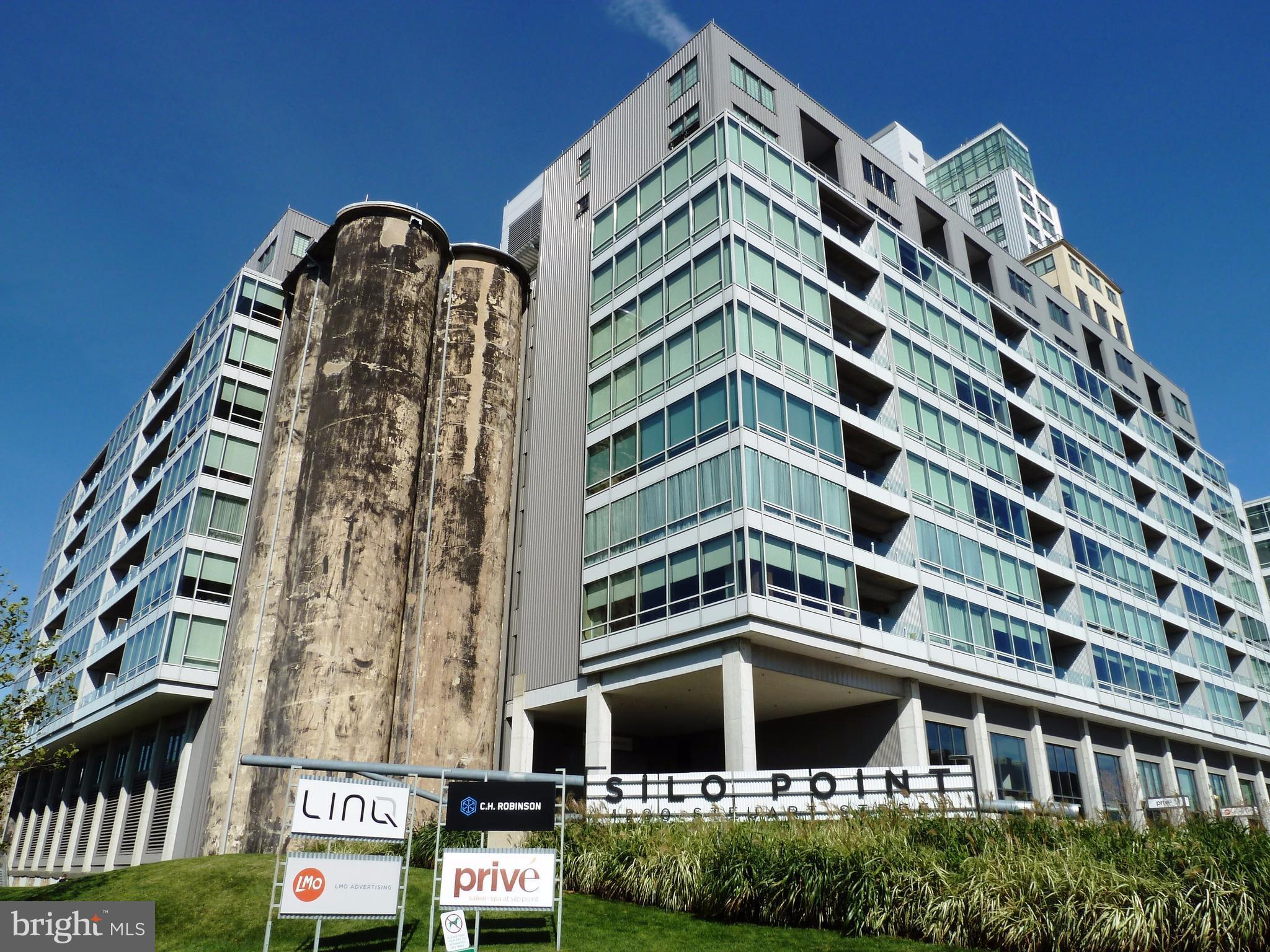 Price Reduced!!! Lovely turn key unit -- Renovated FB w/ glassed in shower & separate jetted tub. 2 car garage pkg! Every closet prof. organized. Stunning water & city views from large covered private balcony & floor-to-ceiling windows. Of course everything else the Silo Pt experience offers: 24 Hr front desk, private gym, 19th Fl Sky Lounge, billiard/dart/shuffle board area, conference ctr.