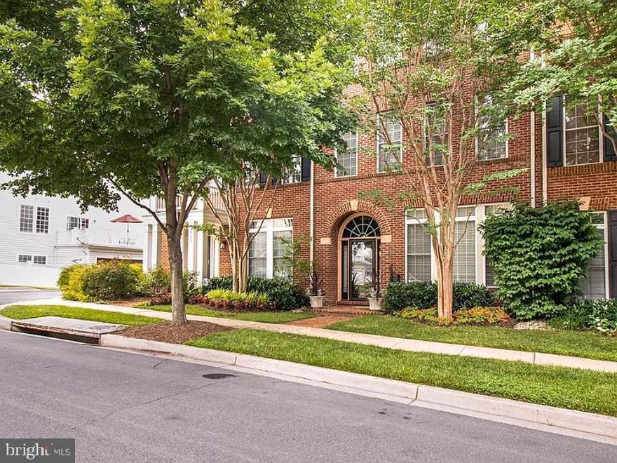 Exquisite high-end, solar powered, energy efficient townhouse with fantastic amenities. Located in the heart of the sought after King Farm neighborhood in Rockville, just minutes from rt-270/Route-355 & the metro, this 3-level home is bigger than it looks! No expense has been spared with the calculated updates for maximum functionality.

The 2-story foyer featuring marble tiles and custom wall paneling. The main level is open and sunny, with 9 Ft ceilings, featuring natural hardwood floors, crown molding, and chair rails. The large family room boasts a gas fireplace, the kitchen has all stainless-steel appliances, granite counter tops, 42-inch cabinets and under cabinet lighting that illuminate the counter tops. A cozy breakfast nook with outside access is perfect for Sunday brunch! If you are into cars, you will fall in love with the custom garage featuring upgraded insulation, climate control, slat wall panels & epoxy flooring! 

Upstairs you will fall in love with the primary bedroom featuring spacious owner’s closets and en-suite bathroom. The pictures of the primary bathroom don't do it justice - you have to see it! Featuring all custom fixtures, soaking tub & shower! The third level has a huge rec room with 2 additional bedrooms and full bathroom! Solar panels for energy efficiency compliment this magnificent home! You'll be amazed at the savings you'll make on your ridiculously low electricity bill.

Additional amenities in the neighborhood include a Clubhouse, 2 swimming pools with jacuzzi, parks and walking paths and trails, dog park, pickle ball and tennis courts playground and  basketball courts. Close to Montgomery college, restaurants and shopping. Close to Shady Grove metro. Near to urgent care, physical therapy center, banks, UPS, post office, dry cleaners for your convenience. Transportation options include a regular  Bus to BWI airport at $45, and a neighborhood shuttle to Shady Grove metro on weekdays. King Farm is an ideal neighborhood for families and businesses, with easy access to I-270, I-495, and three international airports. This property is a must-see.