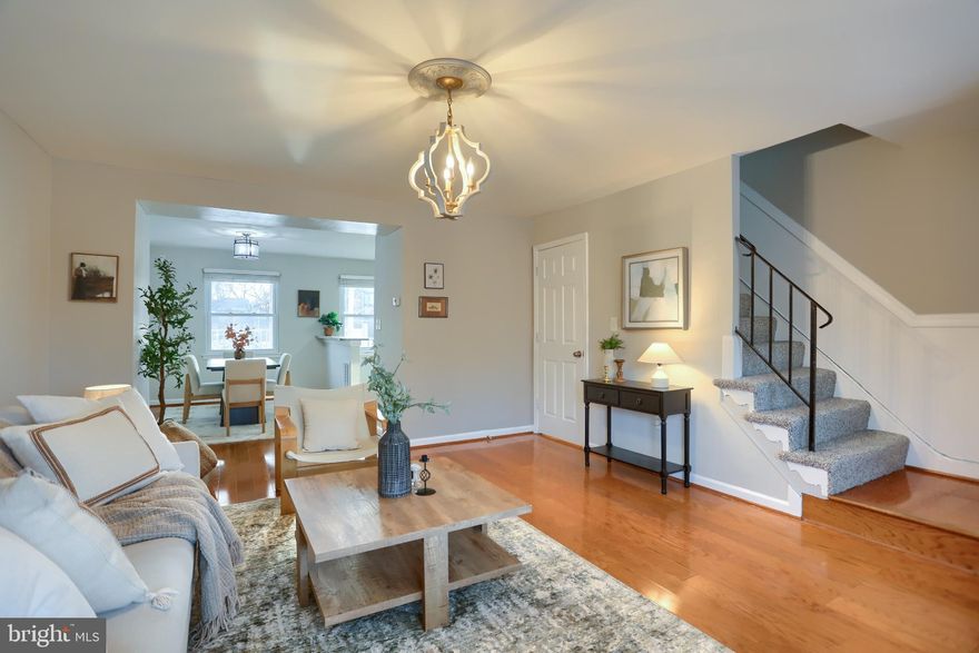 762 Seawall welcomes you just in time for Spring! Beyond the fully enclosed perimeter of white picket fencing, this beautifully updated townhome offers ample outdoor opportunity. Whether you'd like to enjoy your morning coffee while overlooking your flower beds or if you'd like to host a cookout in the backyard complete with a grill pad and projector mount, both spaces have newly constructed Trex decks. As you make your way inside, you are greeted by an open dining and living space beautifully appointed with hardwood flooring. The partially partitioned kitchen is complete with stainless steel appliances and refreshed cabinetry. Freshly painted throughout, the newly carpeted second floor hosts three bedrooms and a full bathroom. The modern updates continue throughout the fully finished basement. With updated LVP flooring, laundry area, full bathroom, and egress to the back yard, this basement is the perfect flex space for a second living room, gameroom, home office, or a place for guests to have their privacy. Offering off street parking and a renovated hard-wired shed, this property has everything you need to call home! Located in the heart of Essex, 762 Seawall is directly off of MD-702, offering quick access to commuter roads US-40 and I-695, and is in close proximity to shopping, local restaurants, and bars. Updates within the past five years include: new front yard fencing 2021, new front decking 2021, concrete slab in backyard with integrated drainage 2022, basement waterproofing 2023, LVP in basement 2023, washer/dryer 2021, new backyard fencing 2025, new backyard decking 2025, stove 2026, new carpet 2026, fresh paint 2026.