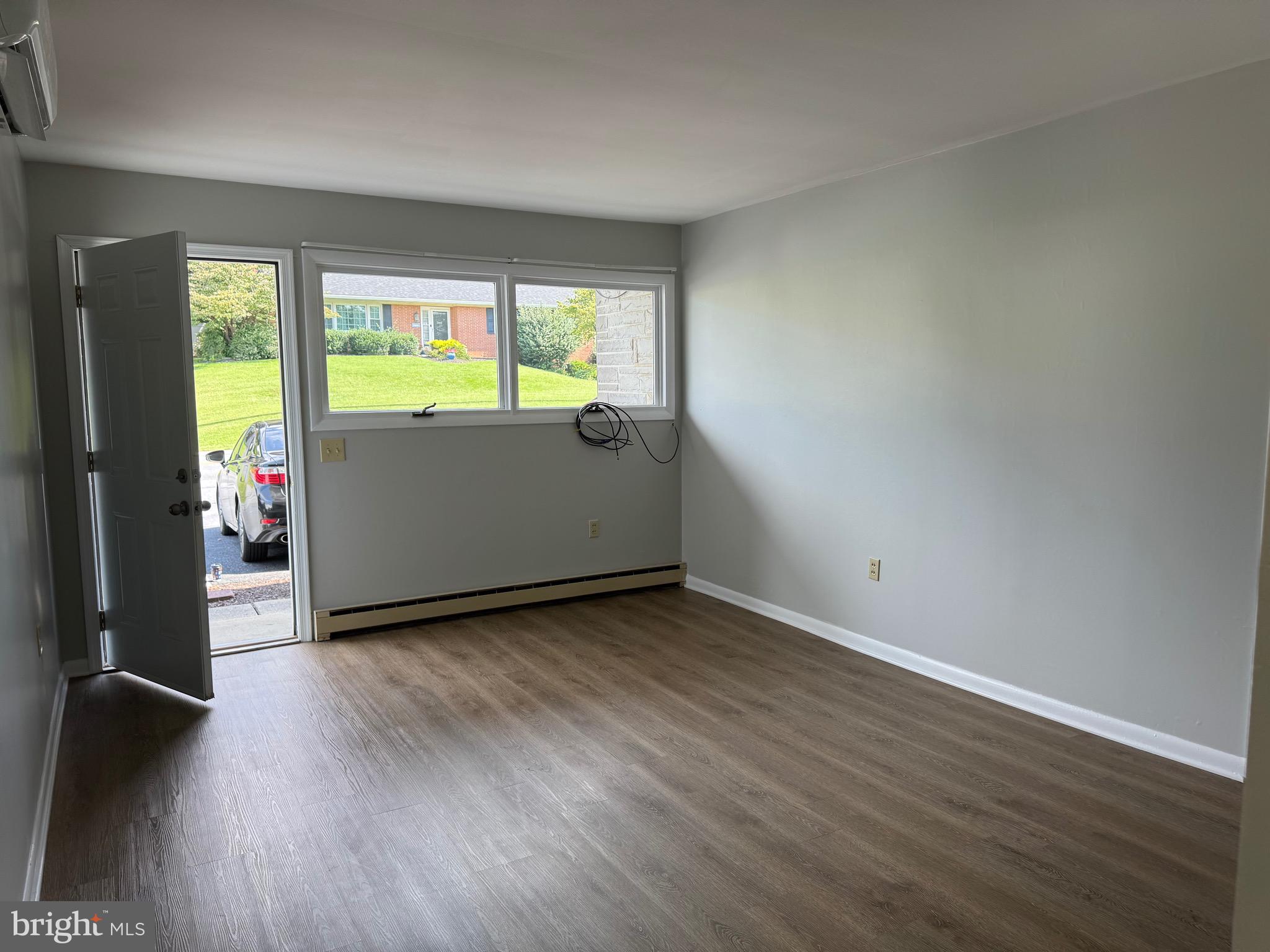 For rent is a first floor 2 bedroom apartment. Apartment comes with washer and dryer. Apartment has new electric mini-splits for heat and A/C. Fresh paint and flooring throughout. Comes with 2 off street parking spaces. Rent includes trash service. $50 nonrefundable application fee required per applicant and if selected $50 admin fee. No Smoking No Pets 625 Min. Credit Score