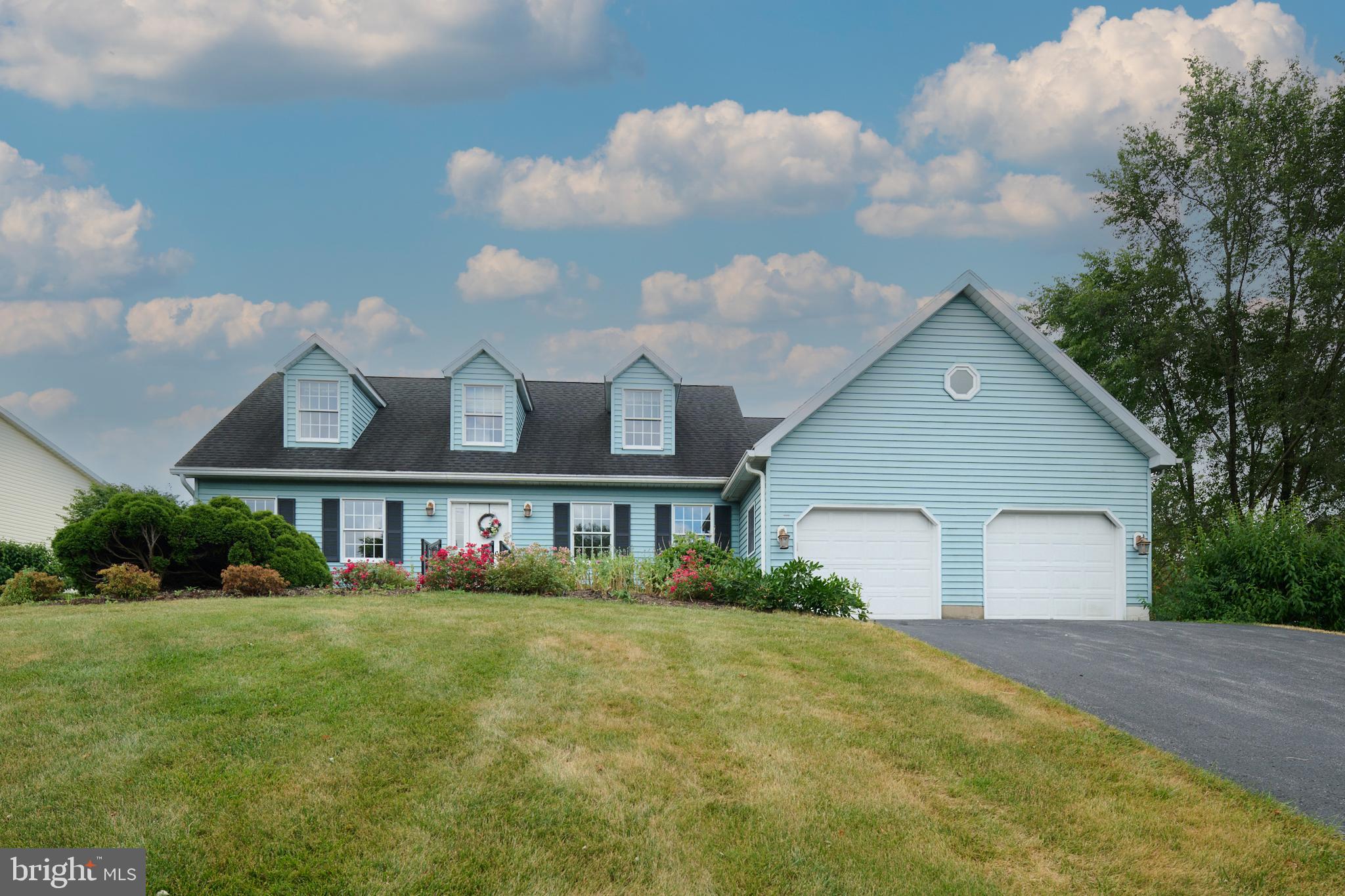 Welcome to this large Cape Cod home located in the Willowbrook neighborhood featuring 5 bedrooms and 3 bathrooms. The first floor features a kitchen that opens to the family room with fireplace, living and dining rooms, two bedrooms and full bath with laundry. The second floor offers a primary bedroom with primary bath, two more bedrooms with full bath and second floor laundry. Enjoy sweeping views of Rothrock State Forest from the back deck surrounded by flower beds. Short distance to downtown Boalsburg and State College. Two car garage, unfinished basement.