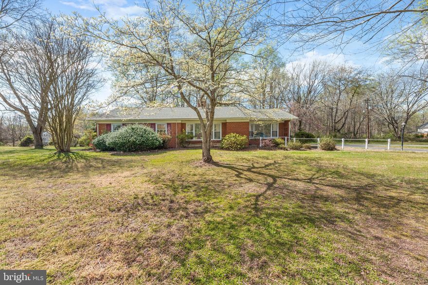 Location, Location, Location!!  All Brick rambler on 1-acre level lot in Northern Calvert, just a minute from the RT.2 /260 intersection. This property features a full 1800 sq. ft. basement matching 1800 s.f on the main floor. The size will surprise you.  Hardwoods on the main floor are in excellent shape. The kitchen has Corian countertops and the house has several unique picture windows allowing loads of natural light into the property. The property is being sold strictly AS-IS.  NO HOA!!!