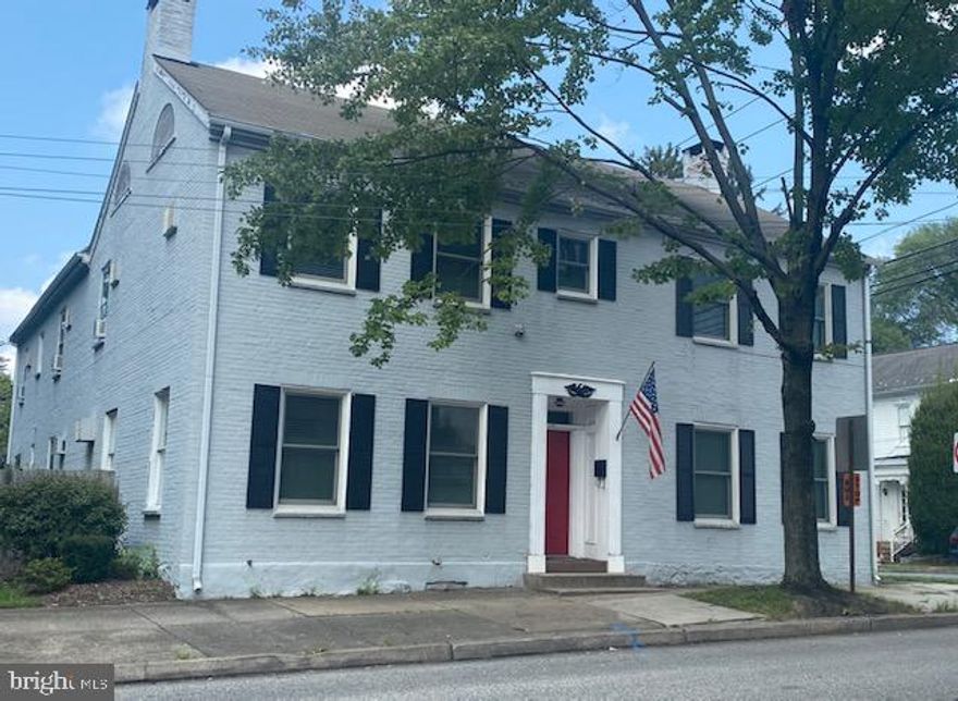 Endless options in this huge historic home (built in 1844) conveniently located on a massive corner lot at E Main St. and Chestnut St. in downtown Mechanicsburg ! Perfect for a large family.  Others possibilities include Multi family with up to 3 rental units already 3 meters for electric , Offices on first floor and rentals on upper level , In law quarters are just some of the options for this home that boasts 2 kitchens , multiple places for laundry hookup , 5 bedrooms with ability to convert to 6 , 4 full bath and a rough in for an extra 1/2 bath , When you step into the backyard you will forget you are downtown.  Large, completely enclosed yard is a functioning Farmette with apple, pear, peach and cherry trees,  a variety of productive berry bushes, a chicken coop/run currently housing for 9 laying hens, rabbit/garden barn, and a massive fenced garden that is still in process of harvest.  Sit out on the large balcony or gather around the fire pit out among the fruit trees.  Tons of storage including a huge dry basement and expansive, walk-up attic.  Parking for at least 5 cars off street.  Bring your ideas and make this your new home, business, rental property or a combination of uses .
