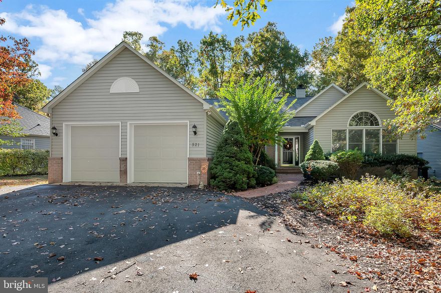 Welcome home to 521 Monticello Circle! This immaculate, updated, and well-maintained home in Lake of the Woods truly has it all. From the moment you arrive, you will love the inviting curb appeal, brick walkway, and beautifully landscaped yard. Upon entering, you are greeted by gleaming hardwood floors, a cozy fireplace, fine finishes, and a sought-after open floor plan. The vaulted ceilings and ample windows allow the sun to shine in and provide so much natural light. The family room, boasting cathedral ceilings, gas fireplace, and access to the screened porch, flow effortlessly into the gourmet kitchen. This expansive chef's kitchen  features a breakfast bar, granite countertops, backsplash, table space, and upgraded stainless-steel appliances. In addition, the formal dining room and living room boasting a wall of windows will make entertaining a breeze. The owner's suite is spacious and offers an en-suite bath featuring double vanities with granite countertops, a walk-in beautifully tiled shower, a luxurious soaking tub, and a spacious walk-in closet with built-in shelves. Grab a book and your favorite beverage and head out to the screened porch surrounded by trees and privacy, as this is sure to become one of your favorite spots. All of this and close to the member-only back gate, too!  A private, gated, secured community, Lake of the Woods offers anything and everything you could possibly want. Home to two lakes (the 550 acre main lake and a 35 acre "fishing lake"), a golf course, an equestrian center, a fire and rescue department, and a church all within the gates, Lake of the Woods simply has it all. Whether your passion is boating, water skiing, kayaking, golfing, horseback riding, or simply taking in the breathtaking views from the clubhouse while enjoying a fabulous meal, from your own deck or yard, or from one of the beaches, you won't be disappointed! Perhaps you'd like a game of bridge or volunteering your time and talents...Lake of the Woods offers more than 60 clubs and/or organizations from which you may choose to become involved. Located in Orange County, we are fortunate to enjoy low real estate taxes. Coupled with home prices ranging from $200,000+ to over $2,000,000, Lake of the Woods is the perfect community for both full-time residents, as well as weekenders. But don't take my word for it, please come see for yourself! I will gladly give you a tour of Lake of the Woods by boat and by car so that you may experience why I love Lake of the Woods!