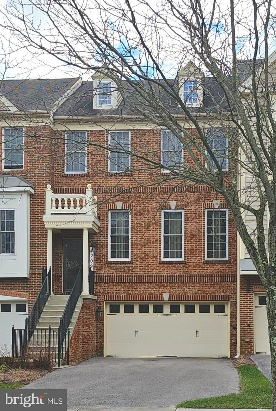 This lovely brick front townhouse awaits YOU!  Entering the community, you'll pass the Marlboro Ridge Equestrian Center and Marlboro Ridge Club House. Feel the warmth of this spacious, light-filled home and envision upcoming opportunities to entertain family and friends in this beautiful home. On the Main Level... entering from the Portico, you'll find the foyer, spacious living room, powder room, dedicated dining room, eat-in kitchen (granite countertops, tiled backsplash, plenty of cabinets, cooktop, mounted microwave oven, wall oven, refrigerator with icemaker), family room with gas fireplace,  sun room and access to the deck with stairs to the lower level; On the Upper Level... a spacious primary bedroom complete with sitting room and 2 walk-in closets; a primary bathroom with skylight, jetted tub, shower and double sinks; 2 additional bedrooms and laundry room;  On the Lower Level... spacious basement with plenty of natural light, theater system, sauna, access to fenced-in back yard and access to 2-car garage. Recessed lighting, Crown Moulding, hardwood/carpet/luxury vinyl planks/tiled floors and sprinkler system throughout. Community amenities include swimming pool, walking/jogging trails, tot lots/playgrounds and more.  10-min drive to I-95, 11- to 15-min drive to restaurants, 12-min drive to Largo Metro Station. Make this home YOUR home today. (Estate Sale being sold As-Is)