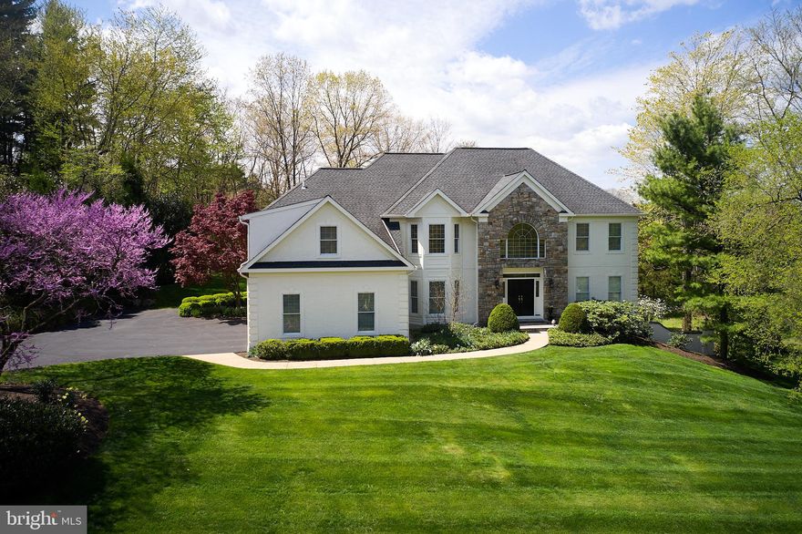 This magnificent home is situated on a coveted interior lot with 1.02 acres of exquisitely landscaped and maintained property in the beautiful and desired Kingswoods neighborhood. Walking distance from the vibrant downtown district, this home is located in New Hope Borough. Exceptionally kept home with numerous upgrades and additions. Immaculate 5 bedroom, 4.5 bathroom house with a finished walk out basement. As you enter the two-story foyer, you will notice the open concept to the rear of the home. On either side of the entry there is the formal dining room and formal living room both separated by French doors with antique glass transoms. The vaulted two-story family room with floor to ceiling stone gas fireplace leads you to the large eat in kitchen complimented with white cabinets, neutral granite, large pantry, and beverage area. A second staircase leads you from the kitchen to the second level wrap around balcony overlooking the family room and foyer. The kitchen has a brand new sliding door that leads you to the oversized rear deck made of Ipe wood. The backyard has beautiful magnolia trees that provide shade, privacy and year around greenery. Beyond the kitchen is the oversized laundry room and rear entryway with tons of built in storage, cabinets, bench and shelves. There is also access to the rear deck, three car garage and powder room. On the other side of the family room you will find the first floor bedroom and full bathroom with tub. Upstairs the primary bedroom has expansive views of the backyard, its own outside balcony, and a large master bathroom with soaking tub, separate shower and water closet. Passed the master bathroom you enter an extensive walk-in closet area with three separate smaller walk-ins, linen closet and a large dressing area with 40 drawer built in. On the second floor you also have a junior ensuite bedroom, and two additional bedrooms that share a bathroom. Down to the finished basement level there is a large area with Prodigy wood flooring big enough for a pool table, ping pong table and more! There is also a separate carpeted room with a gas fireplace and two walk out French doors leading to the lower level patio, flower garden and side yard. The unfinished portion of the basement provides ample storage, second refrigerator, and work bench area. The house includes custom wood plantation shutters throughout the back of the house. The yard is expansive with no road noise. The side yard is big enough to utilize the large lawn, build play areas or even a pool. This home has public sewer and is on well water.