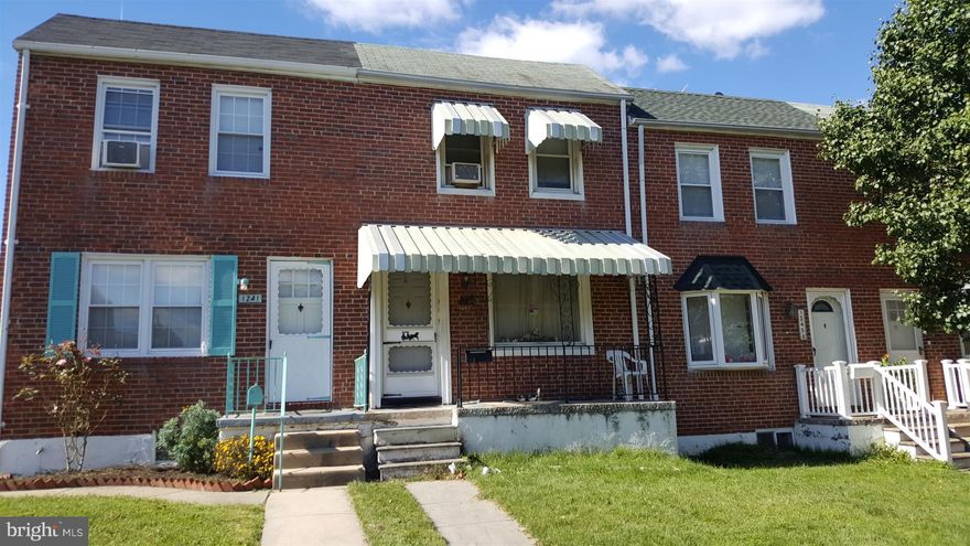 This is an Estate sale sold as-is. All brick town home features covered front and rear porches. Deep fenced rear yard that backs to alley . Open floor plan on main level. Kitchen has been updated in the past. Upper level has 2 bedrooms  and full bath. Bathroom needs updated. Full lower level  offers plenty of room for family or rec room. There is 1/2 bath  and storage area. Has walk out stairs to rear yard.  Easy access to 95  , 695 & rt 40. Close to schools and shopping.