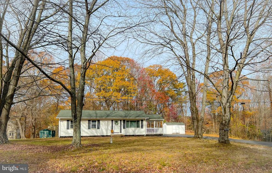 Welcome to this beautifully updated home, perfectly situated on a sprawling 1.16-acre lot just over the Stafford/King George line! Enjoy the best of country living while being conveniently located just 10 minutes from the VRE, 15 minutes to I-95, and only a mile from Sealston Elementary. This home boasts an open-concept kitchen, dining, and living area, creating the perfect space for gathering and entertaining.

Featuring 3 generously sized bedrooms, including a primary suite with its own private half bath, this home has been thoughtfully updated with new flooring, cabinets, and fixtures throughout. The roof and HVAC are only 3 years old, offering peace of mind for years to come.

A charming walk-up attic provides ample storage, while the outdoor living spaces truly shine. Relax on the spacious porch off the kitchen, ideal for enjoying summer meals or morning coffee. The large paved driveway and shed on a concrete pad add functionality to the property.