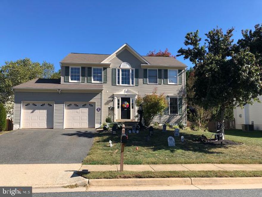 Beautiful Home in a Great Neighborhood.  Many upgrades to include new floors on the main level, basement, and in the master bathroom, stainless steel appliances, granite, neutral paint. Enjoy the finished basement with a rec rm, game Rm, bath, and storage, All rooms are spacious. Newer doors leading to the relaxing deck, new concrete patio, and huge fenced flat backyard. Perfect for Entertaining or Just Relaxing. Brand new front windows. New roof in 2017. This home checks all the must-have boxes.