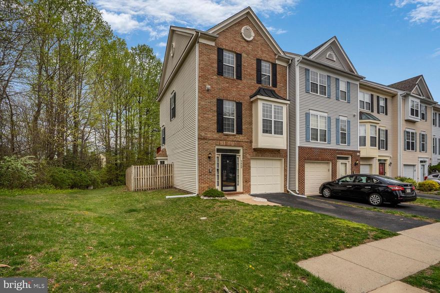 **OFFER DEADLINE MONDAY, 4/14 1PM**LOCATION  End unit townhouse with loads of light filled windows in Blooms Crossing.  Close proximity to plenty of shops, restaurants in Manassas Park and in Manassas of off Liberia Avenue.  Signal Hill Park is just minutes away!  |  ENTRY LEVEL  Enter on basement level to a spacious, two story  foyer, open to living room above.  This is a perfect spot to create a custom drop zone.   Recreation room  in the back of the townhouse is full of light with large windows and sliding glass door to the patio under the deck and a fully fenced yard.  |  MAIN LEVEL  Middle level is the main level of this home.  Staircase leads you to the living room with modern built ins with mirrored back.  Enjoy plenty of space for a large sofa and TV and the every day convenience of a  half bathroom on this level.  Kitchen is located behind the living room and is open to the dining room.  Dimmable overhead fixtures put you in control of the lighting vibe.  Kitchen sink overlooks the deck and trees beyond your yard. (An intercom hub is located under the canvas print behind the dining room table.)  |  UPPER LEVEL Primary bedroom is plenty big with vaulted ceiling, walk-in closet and attached bathroom with double vanities.  Window between the double vanity mirrors allows for natural daylight and has a mini-blind for privacy.  Second and third bedrooms sit in the front of the townhouse and the second full bathroom is between the primary suite and secondary bedrooms. |  IMPROVEMENTS & REPLACEMENTS Roof 2020,  Carpet 2020,  Interior Painted 2025, Microwave, Stove, Dishwasher 2021, HVAC 2022, Refrigerator & Water Heater 2023 |  REQUESTS  Owners will need  to secure their next home.  Please make your contingency deadlines short, settlement fast and post-settlement occupancy to the end of the June or 60 days if possible.
