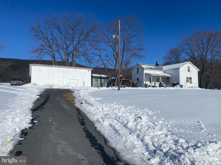 94+ Acre general farm with ample road frontage on both sides of Black Gap Rd zoned residential. Solid frame farmhouse and large block machinery/ storage barn/shop. Approximately 50 acres of rolling tillable land consisting of almost entirely MrB  & MrC loam soil classified as prime farmland. Farm also has a pond for recreation or irrigation. The farm also boasts enviable hunting opportunity with 40+ acres of woods bordered by 1000's of contiguous woodland.