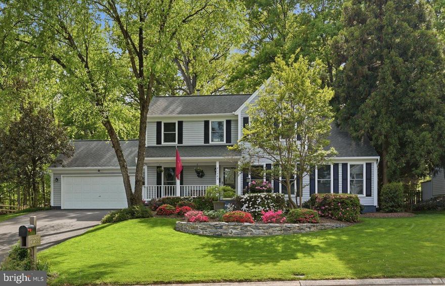 Welcome to this beautiful turnkey home situated on a premium lot in the sought-after Ashburn Farm community, where comfort, charm, and thoughtful updates come together beautifully. A two-story foyer welcomes you inside, leading to the formal dining space that is perfect for entertaining and everyday gatherings. The main-level owner’s suite offers convenience and comfort with vaulted ceilings, a large walk-in closet, and an attached full bath featuring a separate double shower. The kitchen is well-appointed with granite countertops, stainless steel appliances, a built-in microwave, and a casual dining area overlooking the breathtaking two-story family room. Filled with natural light from skylights and enhanced by stunning wood paneling, the family room also features a cozy wood-burning fireplace with a gas starter, creating the perfect gathering space. An updated half bath, renovated approximately five years ago, completes the main level. Upstairs, you’ll find three generously sized bedrooms along with a full hallway bath, offering plenty of room for everyone. The walk-up lower level features a spacious recreation room, a full bath with a standing shower, a wet bar, and a large unfinished storage area complete with custom-built shelving for excellent organization and future possibilities. Step outside and enjoy one of the most desirable outdoor settings in the community. The composite wood deck overlooks a beautifully landscaped fenced backyard with stunning stonework and hardscaping in both the front and back, creating a peaceful and private retreat perfect for relaxing, entertaining, or enjoying nature. Recent updates include all new plumbing throughout the home replacing the original polybutylene pipes, all windows replaced approximately four years ago, a commercial-grade hot water heater installed in 2019, and a roof approximately 10 years old. Immaculately maintained and ideally located close to shopping, dining, major commuter routes, and top-rated schools, this exceptional home is ready for you to create lasting memories for years to come. Photos may be virtually staged