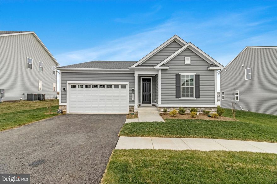 The Alexandrite plan offers many spacious living areas. A covered entry leads past a laundry into an open floor plan, featuring a kitchen with a center island, a dining area, and a great room. The primary suite is adjacent and includes a walk-in closet and private bathroom. You'll find two additional bedrooms and a full bath. Many added upgrades includes a covered patio off the great room, beautiful fireplace with a mantel and a 2-car garage. This home backs up to open green space.