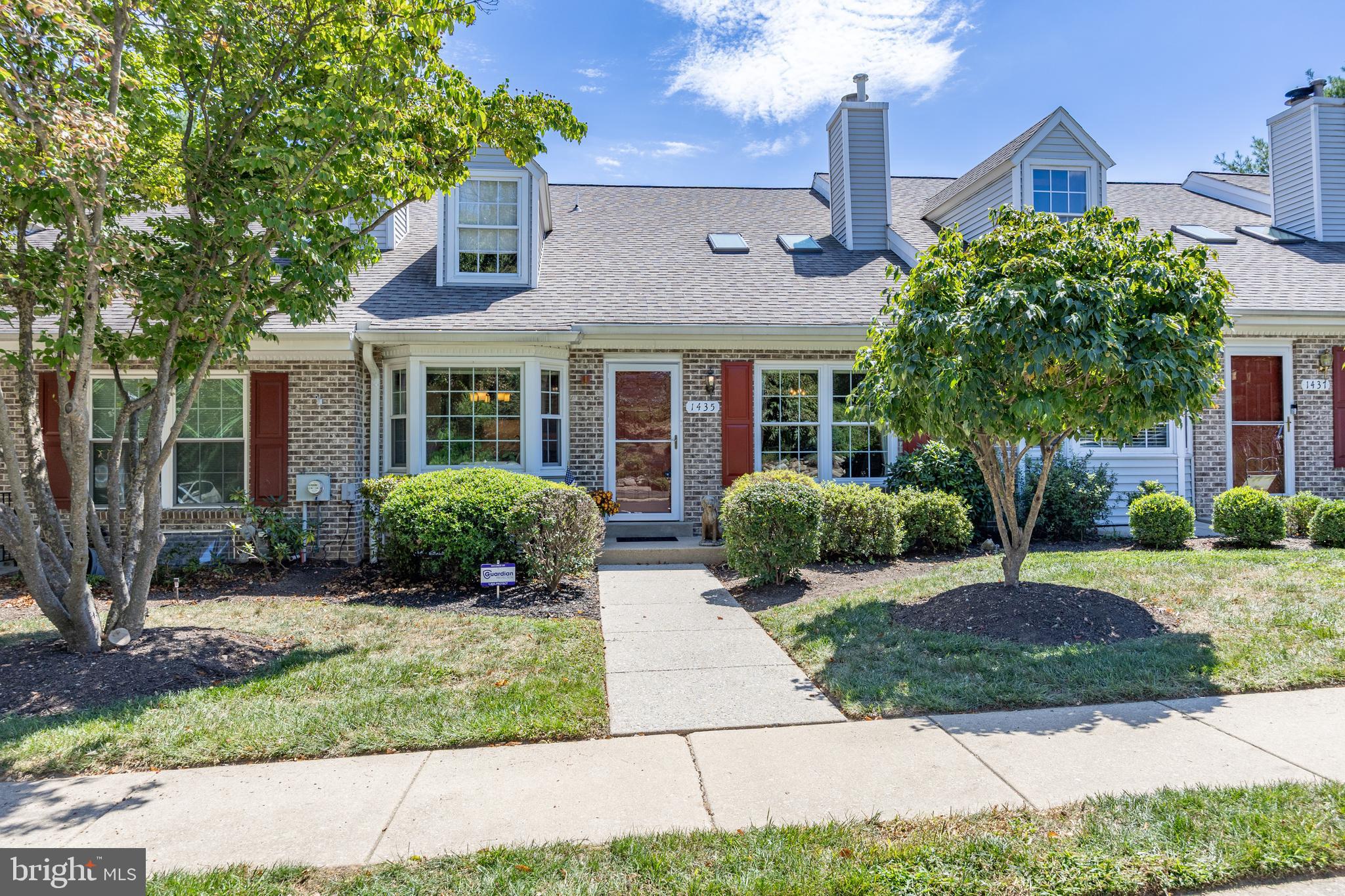 Overlooking the 3rd green of Springfield Country Club, this 2 bed, 2.5 bath home blends comfort, style, and low-maintenance living. Rarely offered, this 2-level townhome offers over 2,600 sq. ft. of living space in the desirable Golf View community!
Upon entering, the main level welcomes you with wide-plank maple floors and abundant natural light flowing in from the larger front window and skylights. Just through the door you'll notice the formal dining room with wainscoting to one side and the updated, eat-in kitchen to the other. Boasting granite counters, custom cabinetry, stainless appliances, and a picturesque bay window with golf course views- This is where you will want to start your day. Down the hall, the primary suite awaits with a renovated ensuite bath and private access to the rear balcony. Another sizable bedroom, renovated full bath, and laundry closet complete the first level.
Downstairs, the walkout lower level offers incredible flexibility with a large den featuring built-in cabinetry and gas fireplace, a flexible bonus room, and a half bath. From this space, you'll find access to a covered patio to enjoy the cool autumn nights to come. Not to be missed is the sizable unfinished space to meet your needs for storage or to expand! Major updates include newer HVAC, energy-efficient windows, and roof.
With a low HOA covering exterior maintenance, lawn care, and snow removal—and easy access to Route 1, I-476, and Route 3—this home offers a lifestyle with the perfect balance of tranquility and convenience. Schedule your tour today!