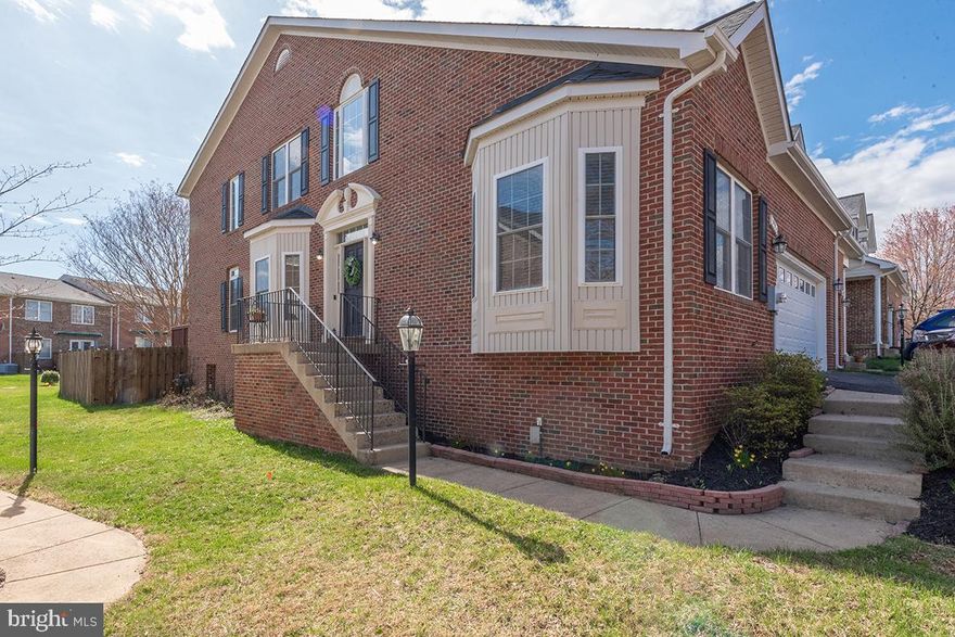 NEW IMPROVED PRICE :) ...Discover the perfect blend of comfort and convenience in this stunning all-brick home, nestled in the heart of charming Warrenton, Virginia. Located in the highly desirable "Northrock Community" with low HOA. This residence boasts three finished levels, an abundance of natural light, and modern amenities designed for effortless living. Step inside to find gleaming hardwood floors and neutral white walls, creating a bright and airy atmosphere throughout. The heart of the home is the bright white kitchen, featuring stainless steel appliances and a stylish new farmhouse style backsplash, perfect for culinary enthusiasts. Enjoy the dramatic two-story great room, anchored by a towering stone gas fireplace, creating a cozy and inviting space for gatherings. A main level primary bedroom with an en-suite bathroom provides convenience and privacy. Two laundry areas, one on main level in kitchen (stackable washer & dryer convey) and one in the basement. Three finished levels offer ample space for living and entertaining. Fully finished lower level offers a den with an electric fireplace, full bathroom, storage area an a "Bonus Room". Make this extra room anything you'd like or enjoy. Perhaps a craft, office or gym room? Endless possibilities...Situated on an oversized corner lot, the fully fenced yard provides a private oasis. A spacious wood deck is ideal for outdoor grilling, entertaining and relaxation. 2 car front load oversized garage.  Experience the charm of in-town living, with close proximity to shopping, banking, schools and parks.  Explore the quaint boutique shops, galleries, restaurants and bars of Old Town Warrenton, just walking minutes away. Enjoy the quiet, established atmosphere of the sought after Northrock Community.  Don't miss the opportunity to make this exceptional Warrenton home your own! Schedule a showing to experience its charm, elegance and value.  Professional Pics are coming soon!