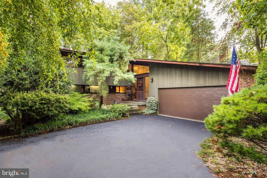 Beautiful Mid Century Modern "Deck House" in the Heart of McLean.  Walk to The Community Center, Library and Central Park.  This house exudes strength and stability. This quality stems from post and beam construction with mahogany, cedar, brick and stone. Light and shadows play nicely through the windows and the Living room Wall of Glass. There are 81 windows and 3 Skylights.  The Deck House Company was founded in 1960 in the Boston area. 

This residence is very private, and with the woods in the back the vistas within and beyond make this home experience special and spacious. Views from the deck are rewarding and sought out daily as never tiring. A holly hedge frames the woods nicely the south and east. The tulip poplars are majestic. Wildlife abound with racoon, fox, deer, squirrels and at least 20 species of birds fill the air with their song.