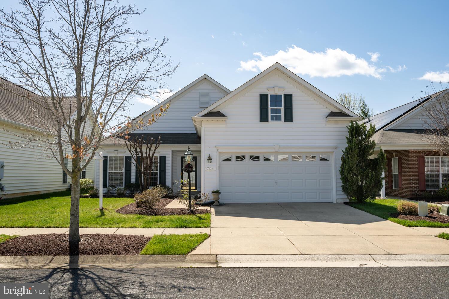 Coming Soon in Symphony Village at Centreville the premier completed community in Queen Anne's County. Welcome to 701 Harmony Way! This true 3 bedroom, 2 full bath, plus front office home is awaiting it's next owner. When you enter this beautiful Gershwin model home, you'll be welcomed by the hardwood flooring that proceeds down the entrance hallway. To the left you'll find the front office and to the right, you'll find the main level laundry room with utility tub and entrance to the large garage with sky basement for additional storage. As you make your way through the home, the formal dining room will be on the left and the 2nd and 3rd bedrooms and 2nd full bath will be to your right. Your eyes will be drawn to the rear of the home and the bright and beautiful sitting area leading the outdoor large patio.
But wait, you won't want to miss the large gourmet kitchen featuring stainless steel appliances and the adjoining family room featuring a side wall propane fireplace.
Lastly is the Master Suite with trey ceiling, his and her walk-in closets and large master bath with split vanity sinks and a large walk-in shower with built in seat.
This home also features a solar system to reduce energy costs.