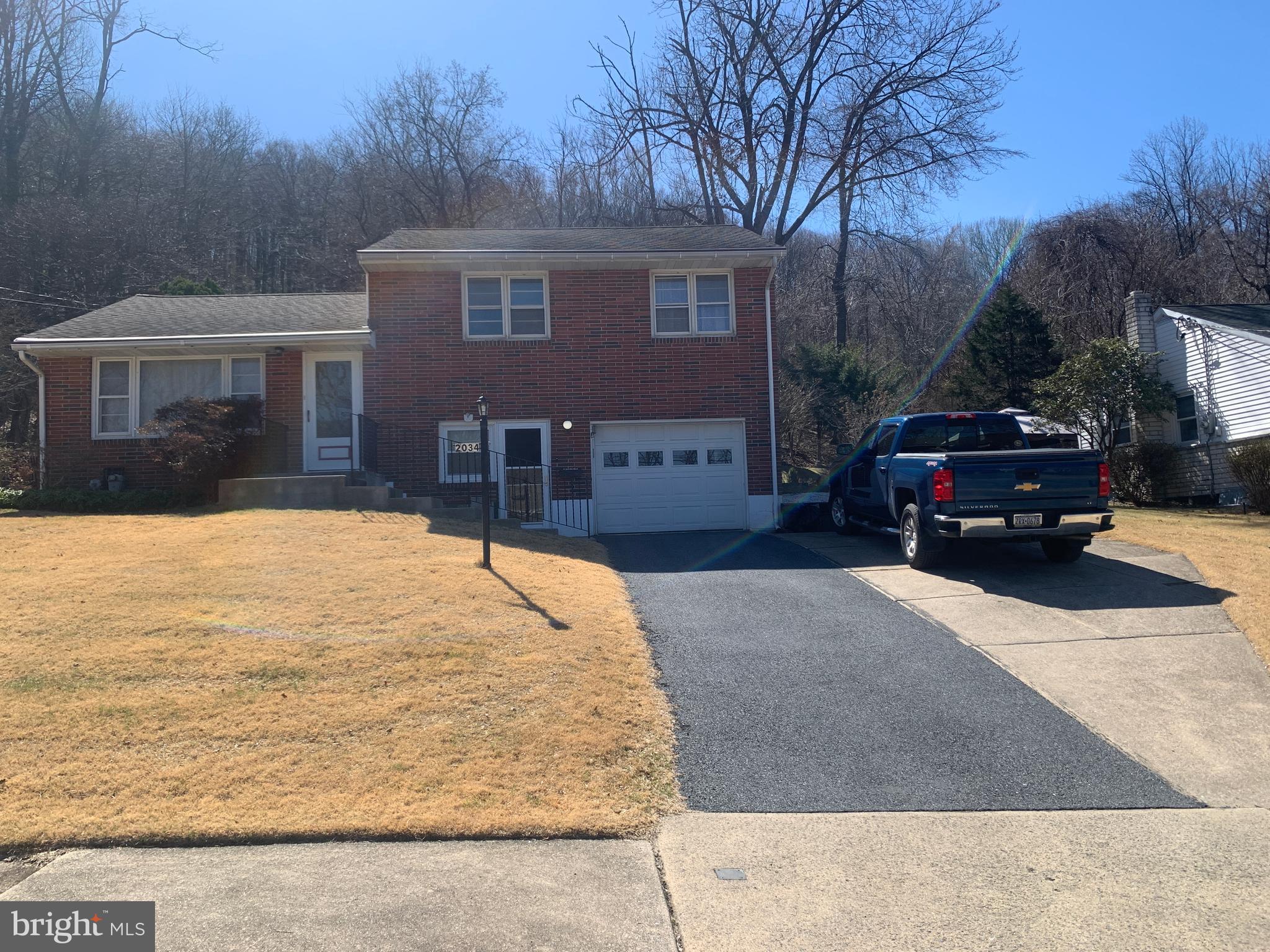 This is a really charming split level, 3 Br 1.5 Bath Brick home is in an ideal quiet location, backs up to 100's of acres of woods, deer, turkey, wildlife abound. Same owner for many years, has super solid bones, needs minor cosmetic updating with decor, oak hardwood floors under carpet, attached garage and 2 car driveway, patio sitting area , 200 amp electric service, A Heil gas furnace, everything is gas. Exterior is a brick with aluminum siding, low maintenance ! Plenty of storage space, additional work shop room off the back of the house! Perfect place to call home and raise a family! This is an Estate ,being sold as-is!