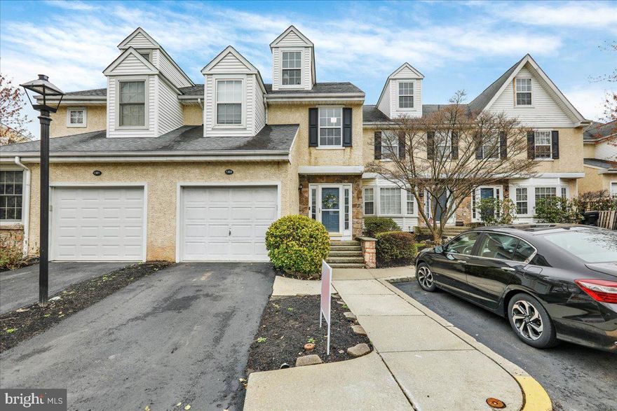 This lovely townhome in OJR Schools epitomizes luxury across its four levels.  The first floor features gorgeous hardwoods and an open floor plan, complemented by a private deck off the dining area. The garage enhances community living with ease.  The second floor comprises two large bedrooms, laundry area, and a full hall bath.  The primary bedroom stands out with vaulted ceilings, a custom walk in closet and a luxurious master bath.  The third floor's expansive loft area, filled with natural light, can serve as a third bedroom, fitness area, or office.  The beautifully finished basement features a full bathroom, new carpets and a wood-burning fireplace. Perfectly balancing coziness and spaciousness, this home awaits your personal touch.