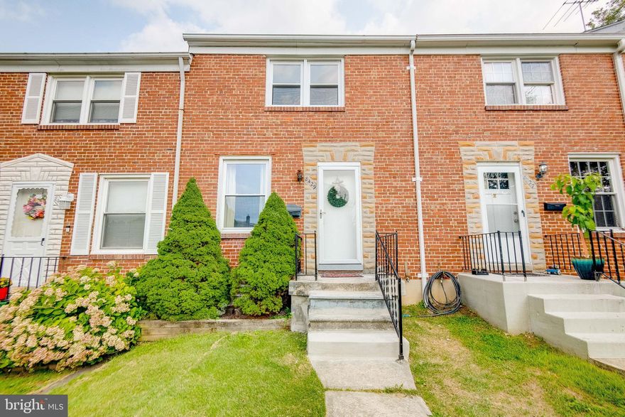 Fresh paint throughout! This two bedroom townhome in the Ridgeleigh community is one to come see! Come on in through the cute front porch and into the bright living space. A convenient coat closet is right around the corner and you'll be glad it is there once the cooler temperatures arrive! The hardwood floors carry through the living room into the dining room with a window to the backyard and ceiling fan. Head into the light and airy kitchen with refreshed floors, newly painted cabinets, and a gas stove. Upstairs the hardwood floors carry throughout both bedrooms. The primary bedroom has a ceiling fan and lots of natural light from two windows. A second bedroom and full bathroom are also upstairs. The lower level has brand new carpeting and a spacious laundry area/storage space. The backyard is fully fenced with a useful shed. There's the option to park 1 car in the back as well! Enjoy all of the amenities in nearby Towson as well as being around corner from 695. This home is move-in ready for its new owners!