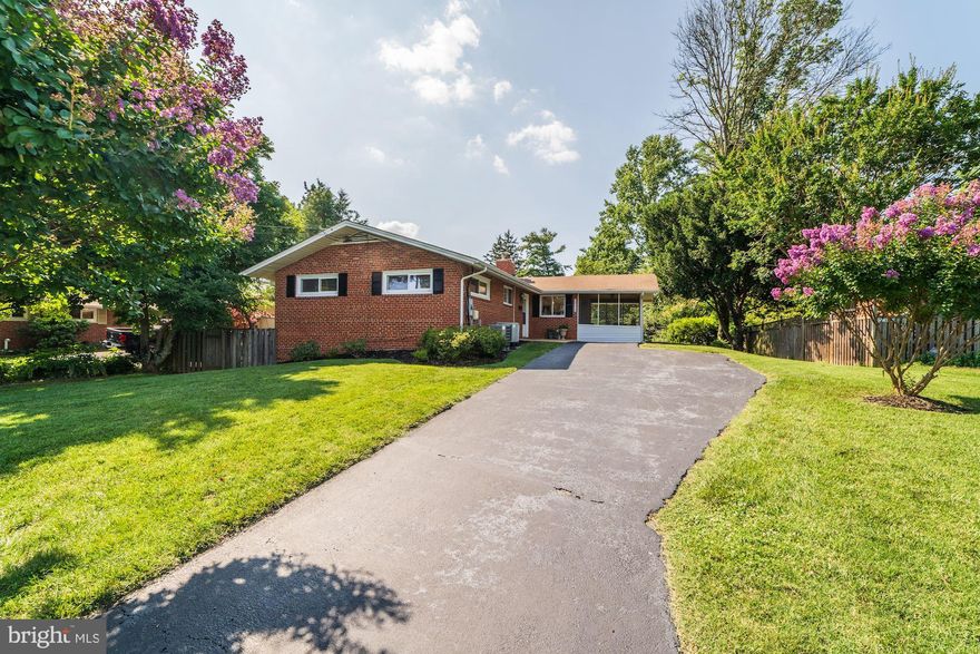 Classic all brick solid construction 4 bedroom home close to everything in Fairfax City. Floor to ceiling windows bathe entire house in light. Fresh neutral paint throughout. Kitchen features brand new stainless steel  appliances, gleaming white Quartzite countertops and new floors. Kitchen leads to a beautiful sun porch where one can enjoy their morning coffee. Hardwood floors throughout. Two fireplaces and a walkout lower level complete with renovated master bathroom with soaking tub and walk-in closet. This home is in walking distance to Van Dyke park and all the parades and festivals featured year round in vibrant Fairfax City (Chocolate Festival, Fourth of July and more!) close to 66, Fairfax County parkway and 495 and Vienna metro. A Commuters dream!