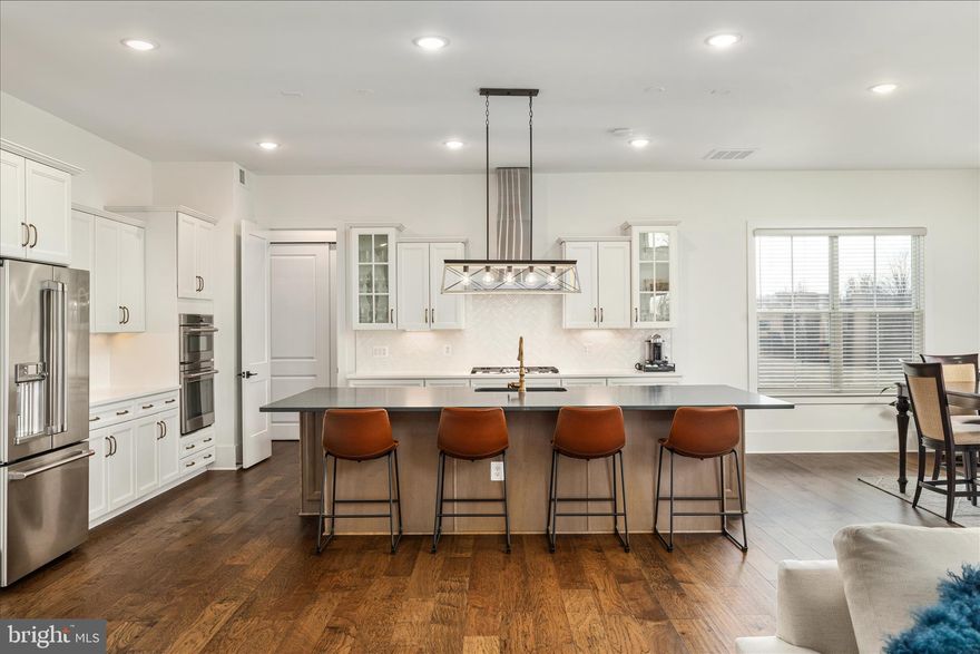 *** OPEN HOUSE:  Saturday | April 18:  1:00 - 3:00  ***
<br> <br>
Welcome to Windyhill Farms - a like new home that is East Facing and sits on a 1.56 Acre lot.  The heart of the home is the breathtaking kitchen - with its huge island and upgraded appliances.  The kitchen is open to the two story family room that is anchored by the soaring stone fireplace.  The main level also has a private office, formal dining room, living room and mud room.  
<br> <br>
The highlight of the second floor is the oversized primary suite with a bonus area, spa like bath and walk in closet. There is a guest bedroom with an ensuite bath.  The remaining two bedrooms share a bath.  
<br> <br>
The finished lower level has a huge rec room with a wet bar rough in.  The full bath has a custom steam shower.  Lower level has a huge storage area. 
<br> <br>
This home sits on a large, private lot with an irrigation system and shed.  From the deck you can enjoy views of the common area, trees and pond.  Tanager is located in the heart of Loudoun county, close to commuter options, Dulles Airport, shops and restaurants. Come check out all this home has to offer in sought after Tanager community.