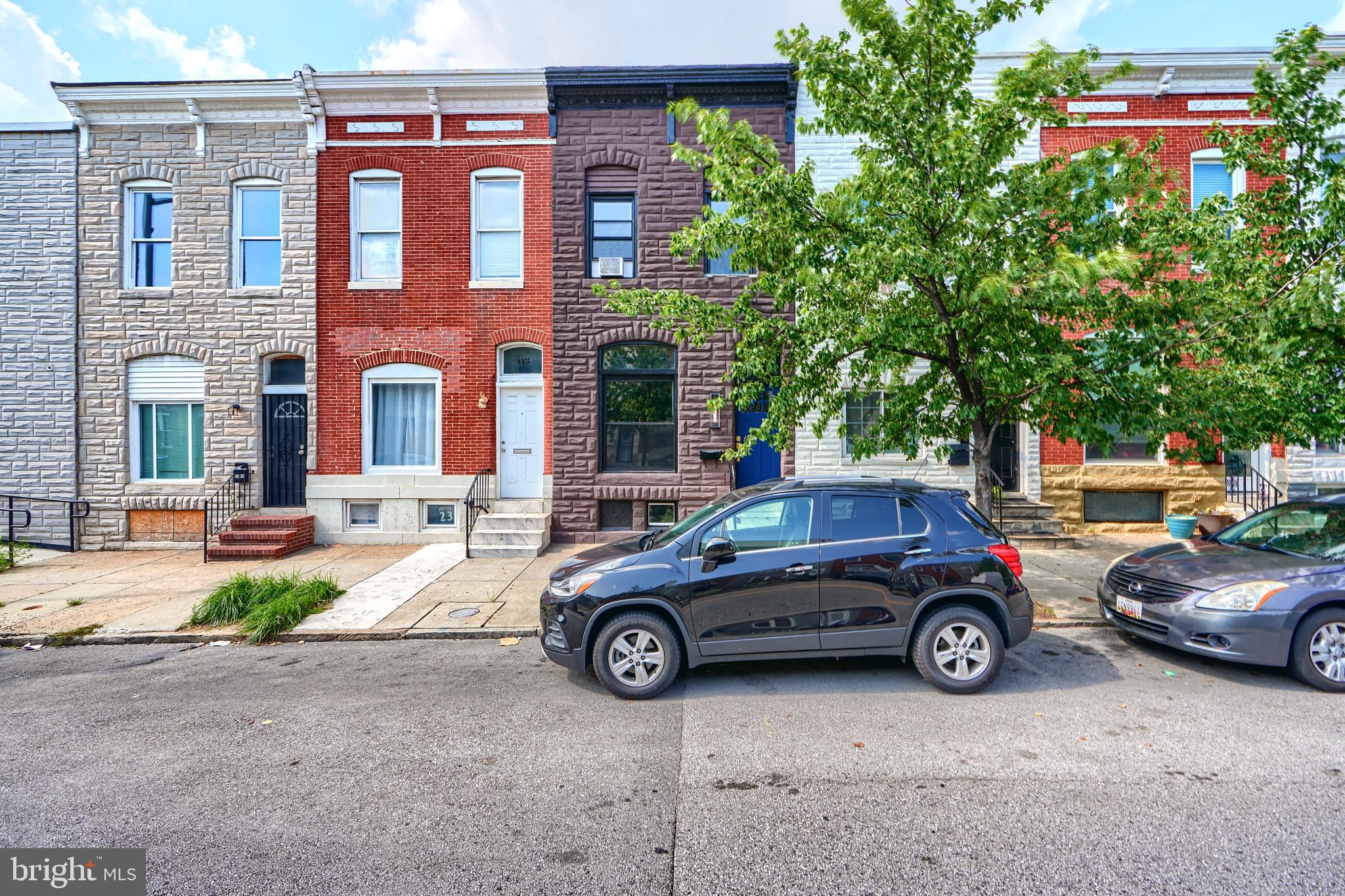 THE LIST PRICE REPRESENTS THE OPENING OFFER AMOUNT (NET TO SELLER). AGENTS - PLEASE VIEW AGENT REMARKS IN BRIGHT MLS.
This home perfectly blends classic Baltimore charm with modern elegance. Step inside to be greeted by dual-sided brick walls and a focal point faux fireplace with a custom mantel that adds warmth and character. The standout staircase features iron balusters, while the kitchen shines with a custom peninsula showcasing wood slats and a waterfall stone countertop, complemented by stylish two-tone cabinets and gold hardware. Throughout, brand-new LVT flooring and natural wood finishes create a welcoming atmosphere. Recent 2025 updates include a full kitchen and bathroom renovation, updated doors, fresh interior and exterior paint, new oversized windows, fencing in rear, new washer/dryer, and updated lighting with some electric work (panel replaced in 2016). With spacious rooms ideal for entertaining or roommates, plus easy parking and walkability to Patterson Park, this move-in-ready home is a must-see!
Please schedule all showings online via Showing Time.
Offers will be accepted through Thursday, August 7, 2025 at 1:00 pm.
AT SELLER'S DISCRETION, AN OFFER MAY BE ACCEPTED AT ANY TIME.