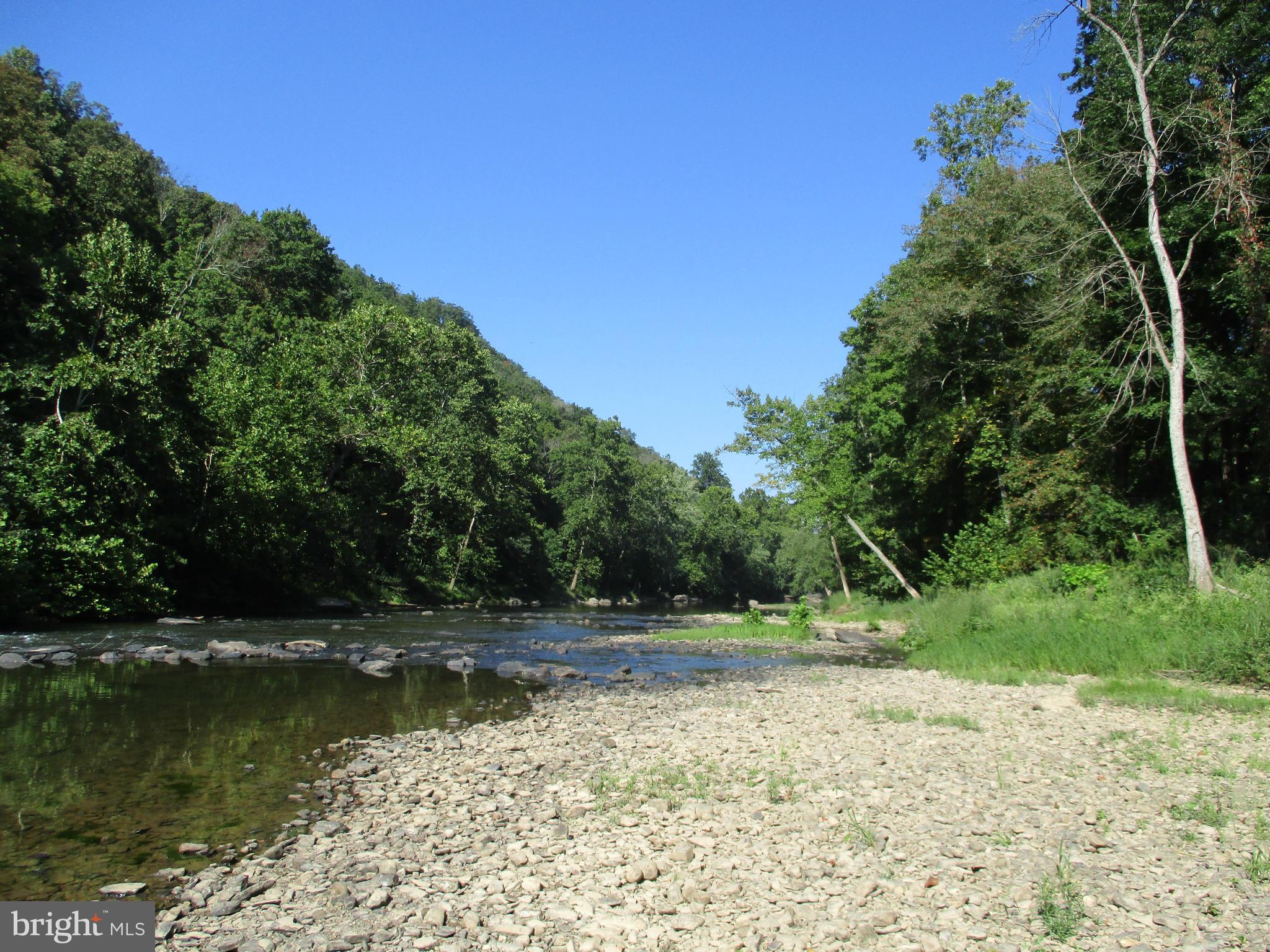 Hard to come by waterfront lot located in Golladay community. Bring the kayak, fishing pole or just a chair to relax along the Cacapon River. Camper conveys property is being sold AS-IS.
