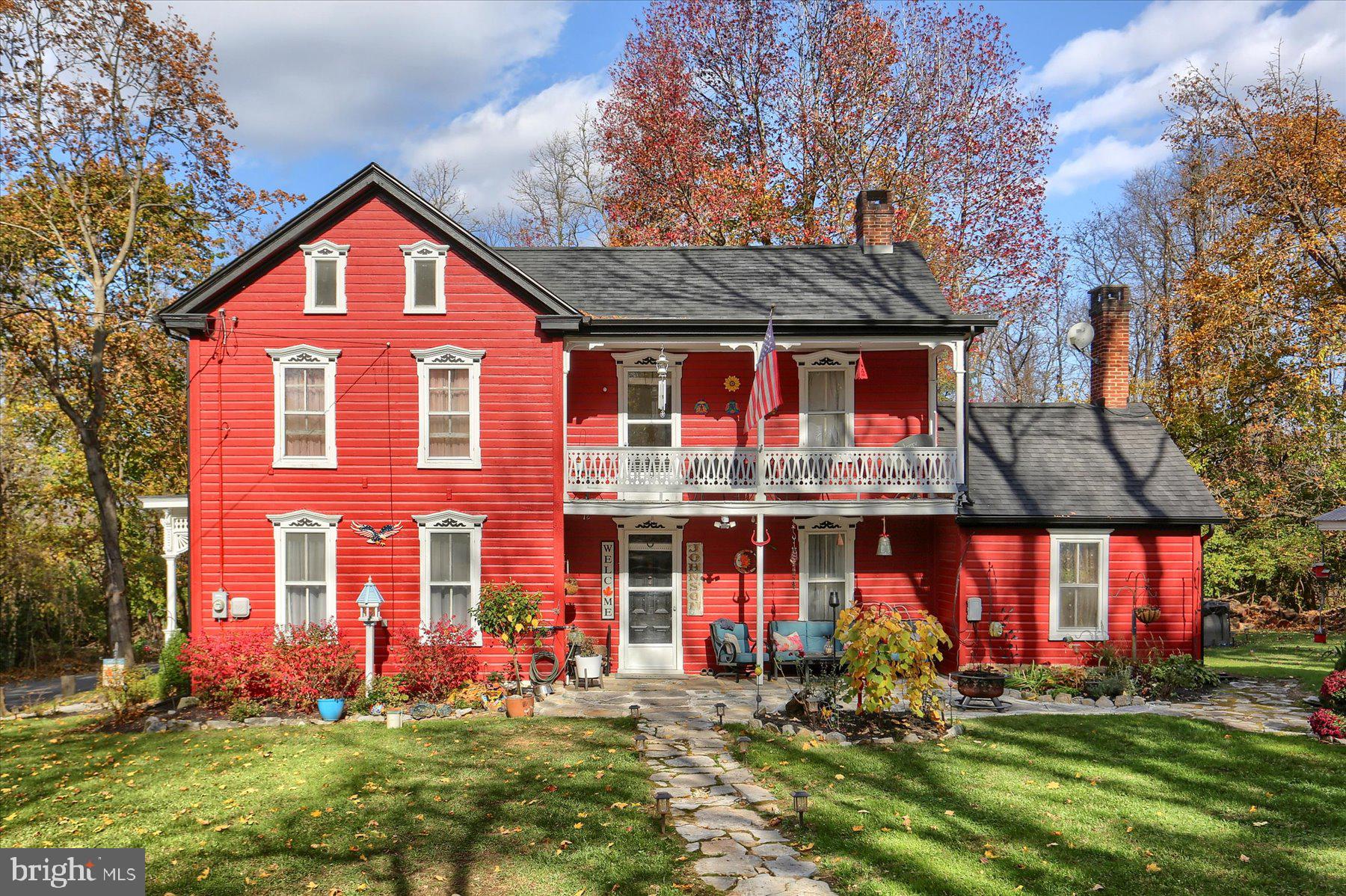 Historic Farmhouse Retreat with Modern Comforts on 1 Acre. Step into timeless charm with this beautifully restored 1900 farmhouse, blending historic character with tasteful modern updates. Nestled on a private 1-acre lot, this serene property is surrounded by trees and farmland, offering a
peaceful retreat from the hustle and bustle. With approximately 2,400 square feet of living space, this spacious home is perfect for relaxation or entertaining. It features three generously sized bedrooms, including a primary suite with a quaint balcony overlooking the expansive backyard. An
additional front balcony off the upstairs hallway provides even more outdoor space to enjoy. Inside, the home is brimming with cozy charm. The family room, complete with a fireplace, opens through custom-crafted wooden French doors with stained glass to the formal dining room, where a beautiful
wood stove adds warmth and character. The large living room, located just off the kitchen, offers plenty of space, and a cozy den with a vaulted ceiling and a wood stove creates a welcoming nook for relaxing. The recently remodeled kitchen is a cook's dream, featuring a large island, butcher block countertops, and all-new appliances. Gorgeous hardwood floors flow throughout the home, enhancing its classic farmhouse appeal. Additional highlights include a brand new two-zone high-efficiency HVAC system as well as a new architecture roof. There is ample storage with a huge attic which provides extra storage space, while the basement offers both interior and exterior access and includes a laundry room, with an option for
main-floor laundry hookup or pantry area. Enjoy your charming exterior that has been freshly painted to preserves the farmhouse aesthetic while adding a touch of modern flair. The front yard boasts a new stone walkway, a covered porch, and an adorable she-shed/greenhouse as well as a freshly professionally paved oversized driveway. The backyard is an oasis. Enjoy the expansive backyard with a stone patio, fire pit, shady trees, a storage shed, and plenty of space for outdoor gatherings..Don’t miss the chance to own a perfect blend of historic beauty and modern convenience!