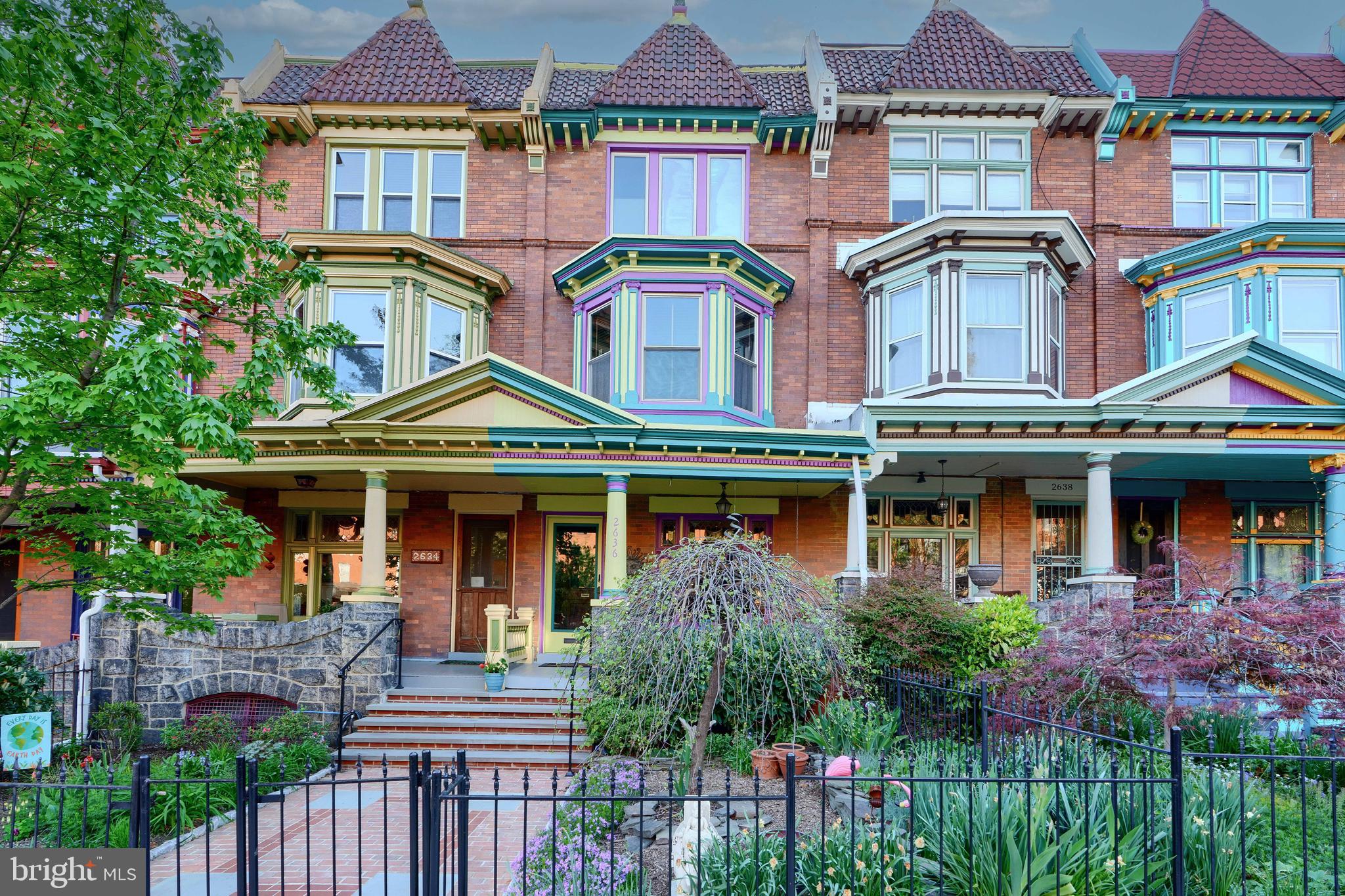 Discover the allure of this exquisite painted lady, perfectly nestled in Charles Village, where historical charm meets modern luxury. The pictures simply don't do it justice. This remarkable home is centrally located to enjoy everything the city has to offer—whether you're catching a train, enjoying a theater show, exploring the harbor, or heading to a game at the stadiums. With walking access to JHU, Union Memorial, and any number or restaurants and attractions, you are right in the heart of it all.
This beautifully restored early 1900s home boasts intricate woodwork and stained glass, seamlessly blending classic architectural details with modern amenities. Enjoy the comfort of a two-zone HVAC system and energy-efficient windows.
You will delight in the generous outdoor spaces, including a welcoming front porch, a charming back deck, and a two-level roof deck. The private roof deck offers a sweeping view of downtown, and you'll have a front-row seat to breathtaking fireworks displays on the 4th of July.
Inside, the exceptionally large kitchen is a chef's dream, featuring ample storage, abundant counter space, purified water, a double oven, a large refrigerator/freezer, a ceiling speaker for music, and a gas range.
Retreat to the primary bedroom suite, a sanctuary complete with a modern bathroom, ample closets, dressing areas, and its own washer/dryer. Additional conveniences include a full-sized washer and dryer in the basement, a secure carport that doubles as a patio, and available street parking.
Enjoy the versatility of a 3+ season enclosed back porch with an electric fireplace/heater and a semi-finished basement/media room with plenty of storage space.
Stay connected and secure with wiring for ADT or compatible alarm systems throughout the home. You'll love the convenience of being just two minutes from the JHU shuttle and Purple Line connector bus, with a playground right on the corner.
Come home to welcoming and friendly neighbors in this vibrant community, and experience the best of city living in a home that offers comfort, style, and convenience.