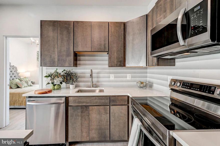 Discover your ideal apartment in The Brixton, where luxury living meets historic charm in the heart of Fells Point. Nestled in this picturesque neighborhood, our stunning apartments offer a refined living experience.

Built in 2023, these new apartments step into open floor plans with soaring ceilings, creating an airy, welcoming ambiance that's flooded with natural light. Your gourmet kitchen, adorned with sleek stainless-steel appliances and brushed nickel hardware, will inspire your inner chef. The custom walk-in closets, engineered hardwood flooring, quartz countertops, Philip Jeffries wallpaper, and posh lighting add more than a touch of opulence to your everyday routine.

Welcome to Fells Point, where charming cobblestone streets meet the waterfront. This pedestrian-friendly neighborhood boasts an array of bars, top-rated restaurants, and boutique stores. It's also home to one of Baltimore's most luxurious hotels, The Pendry. Explore historic streets, savor a lively culinary scene, and immerse yourself in the rich history and vibrant culture of this unique Baltimore neighborhood.

Your oasis at The Brixton awaits and we are ready to help you find your dream apartment!

Please note that the photos are of a model apartment home at The Brixton; however, the Matterport shows the actual apartment home.