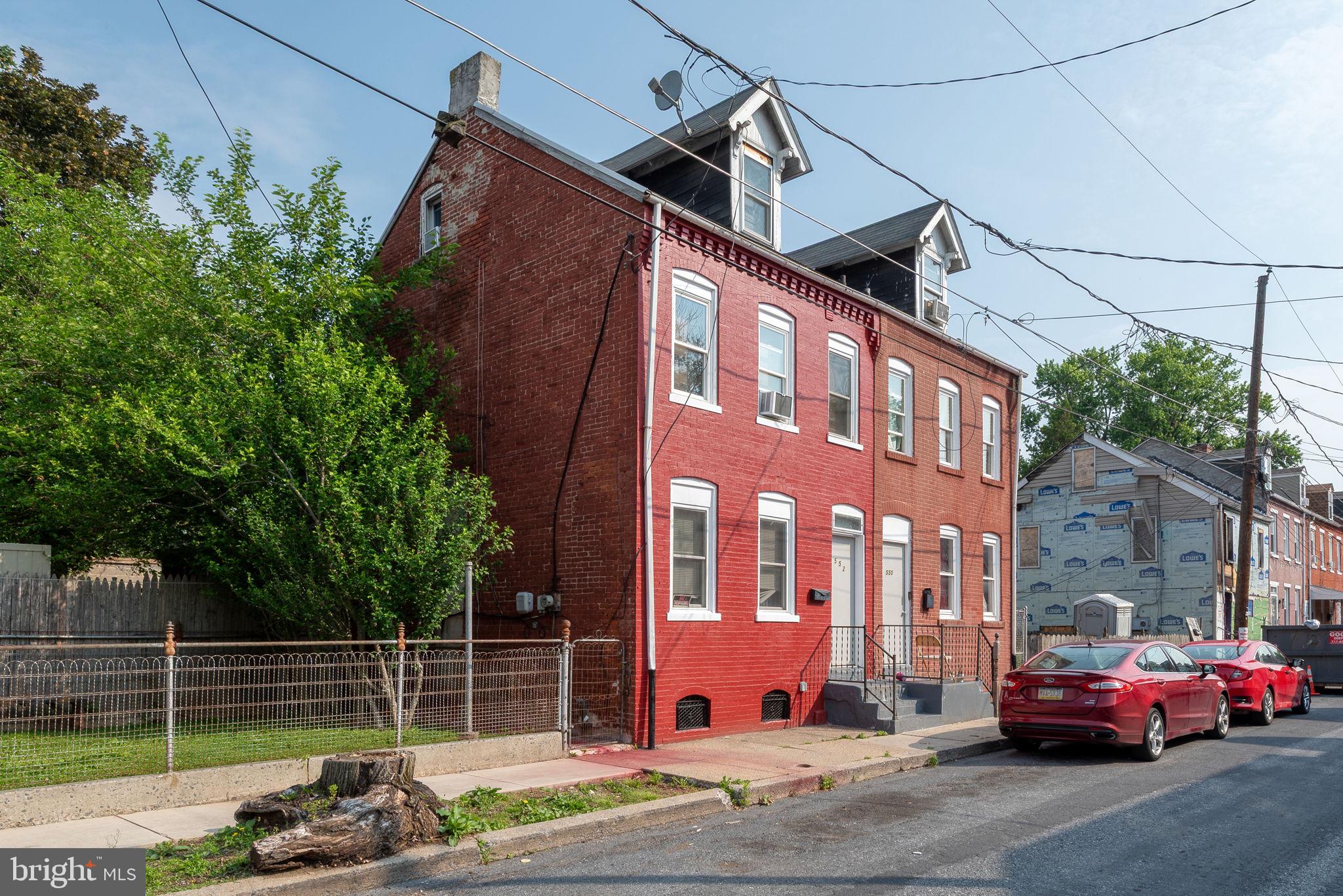 Welcome to 552 Woodward St, Lancaster, PA 17602—a semi-detached brick colonial offering both character and potential. This classic brick 4-bedroom, 1.5-bathroom home has over 1,350 sq. ft. of living space with a spacious living area, dining room, first floor half bath, eat-in kitchen with access to private fenced rear yard. The second floor offers 3 private bedrooms and full bath. The 3rd floor offers space for 4th bedroom or den. There have been several updates: updated electrical, replacement windows, flooring, and paint. The home is located in the Churchtowne neighborhood, close to local schools, parks, shopping, and major roadways, making it an excellent choice for homeowners or investors. Don't miss out on this incredible opportunity—schedule your showing today!
