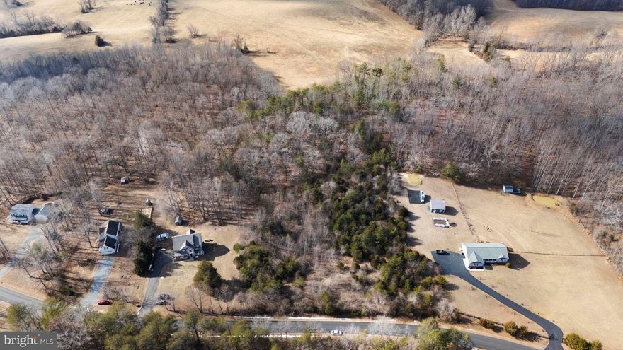 Ready for a spring project? Discover this beautiful, wooded 2.1 acre lot tucked away off a private road—a true blank palette awaiting your vision. Build your dream home surrounded by nature and privacy.