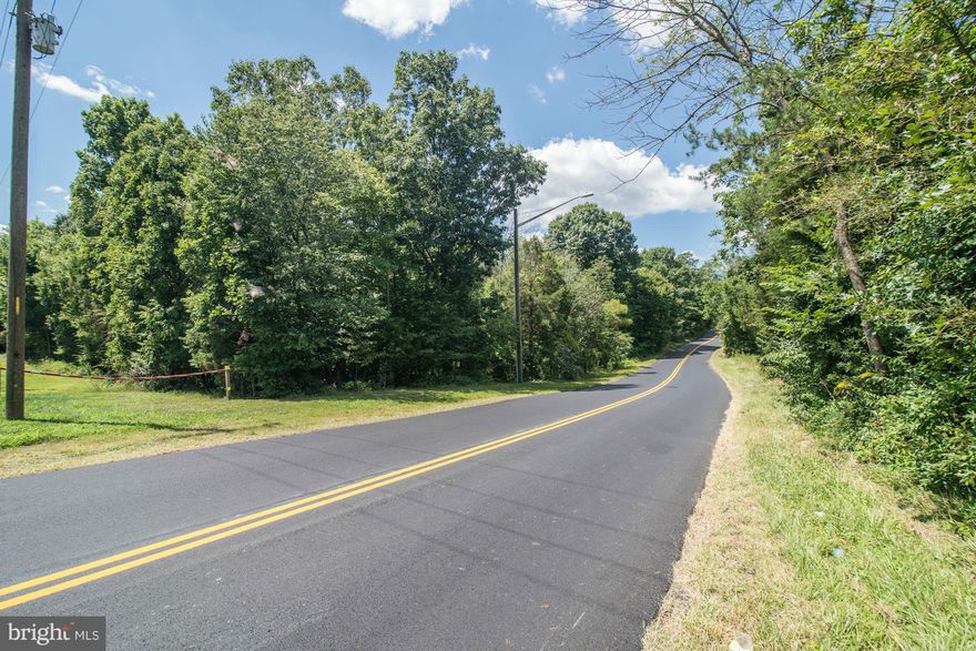 18.4693 acres in Fairfax County! Beautiful Cub Run runs through the back of the property.  Zoned 1 house per 5 acres.