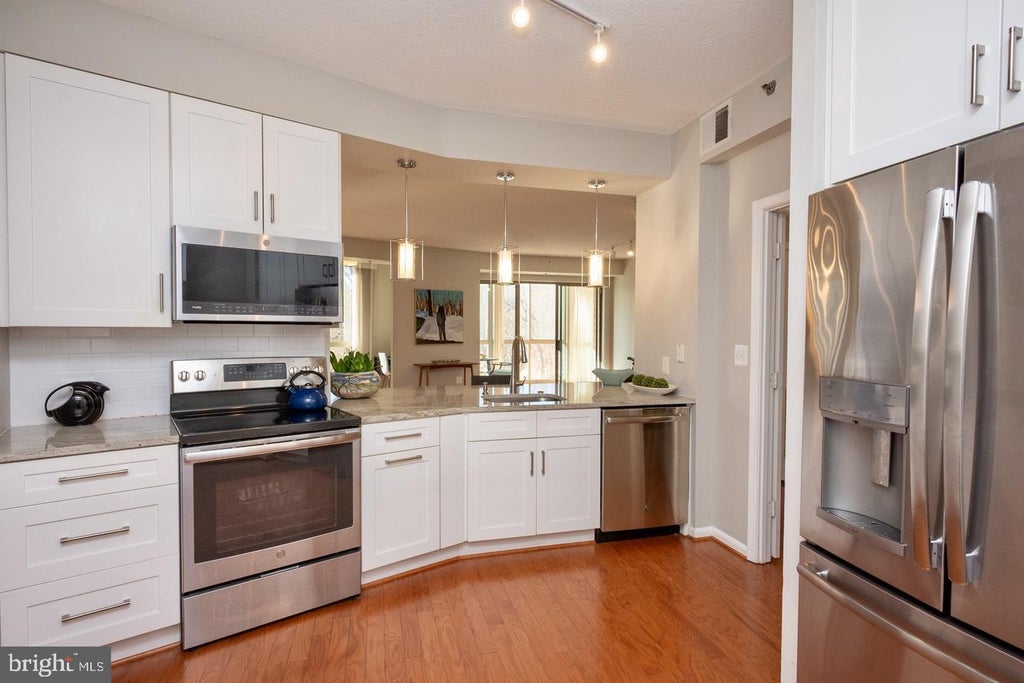 Photo of 3200 N Leisure World Boulevard #219, SILVER SPRING, MD 20906 (MLS # MDMC2261234)