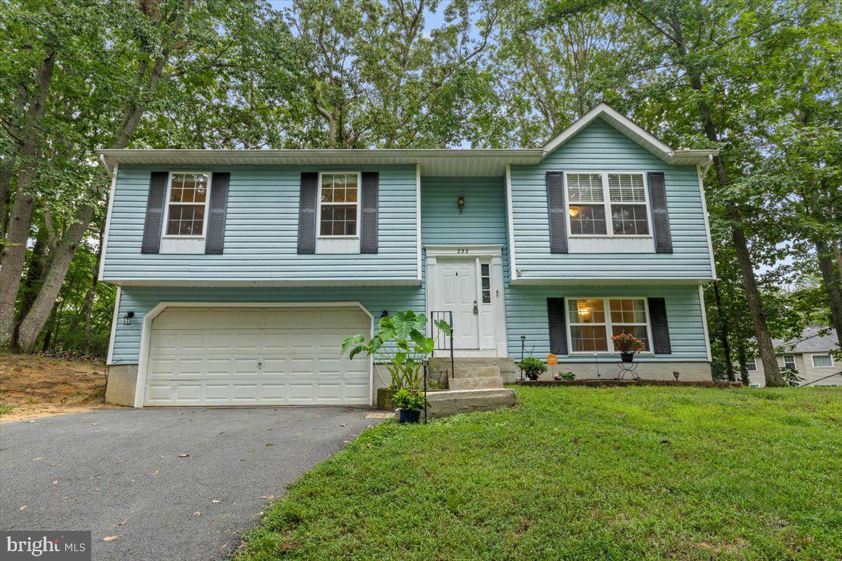 Come see this charming 4BR, 2BA home in Lusby! This well-maintained home offers a perfect blend of comfort and functionality. The spacious layout features four generous bedrooms, two full baths, and multiple living areas perfect for entertaining or relaxing. Enjoy peace of mind with recent updates including a new HVAC system (2023) and septic (2021). Garage Door System has also been recently updated with new springs, new cables, new rails, outside code panel, inside panel and a backup battery. This property offers both privacy and convenience—just minutes from local amenities, schools, and waterfront attractions. Don’t miss your opportunity to own this move-in ready gem!