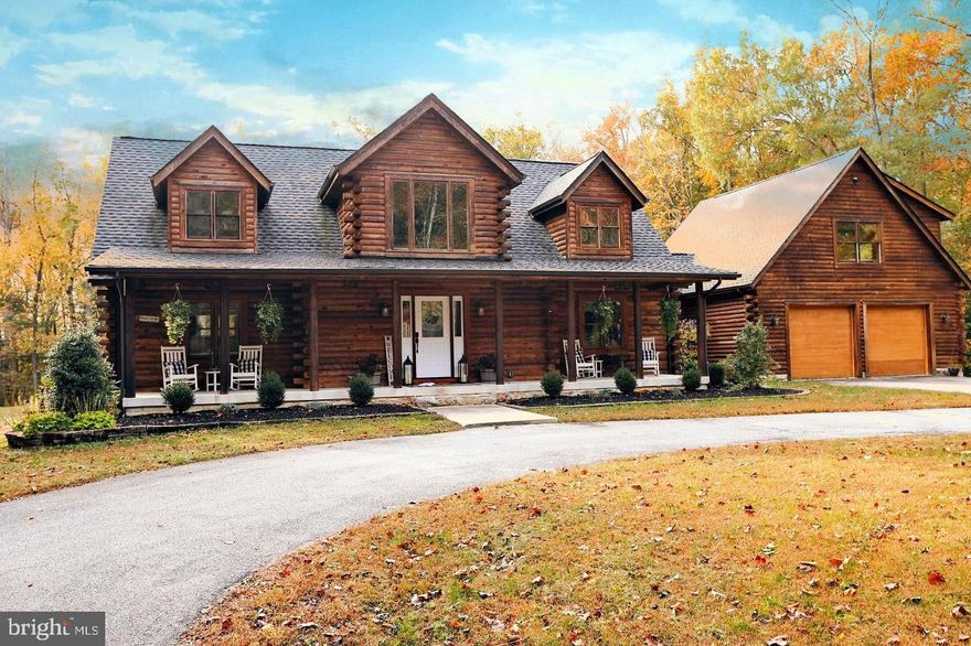 Welcome to Hidden Creek Farm, featuring 328 spectacular acres of waterfront property adorned with a luxurious Main Cabin, Guest Cabin, Metal Barn, Horse Barn and 2 hunting cabins. Travel the 1 mile of fully paved driveway to arrive at the picture perfect Main Cabin featuring 4 bedrooms, 3.5 baths and 3 levels of gorgeous living space. The main level boasts a gourmet kitchen, living room, screened-porch, and primary suite  with walk in closet, private entrance to the jacuzzi deck and newly remodeled en suite. A spacious mudroom, half bath and laundry room round out the main level. The upper level features two bedrooms with ample closet space and a full bath in the hallway. The large, newly carpeted and painted, lower level presents endless opportunity for additional rec space and hosts a separate theater room w/ screen and projector. The spacious loft bedroom features its own, newly remodeled, bathroom and overlooks the sanctuary-like backyard with an expansive, newly refinished deck and brand new (2020) inground, saltwater pool with pebble bottom and waterfall.  The Guest Cabin was fully remodeled in 2018, and the large commercial metal garage, with heated floors, built in 2019.  Miles of private trails wrap through some of the best hunting ground in all of North America and make this the perfect home for outdoor enthusiasts or anyone looking to create their own retreat just 45 short minutes outside of DC.