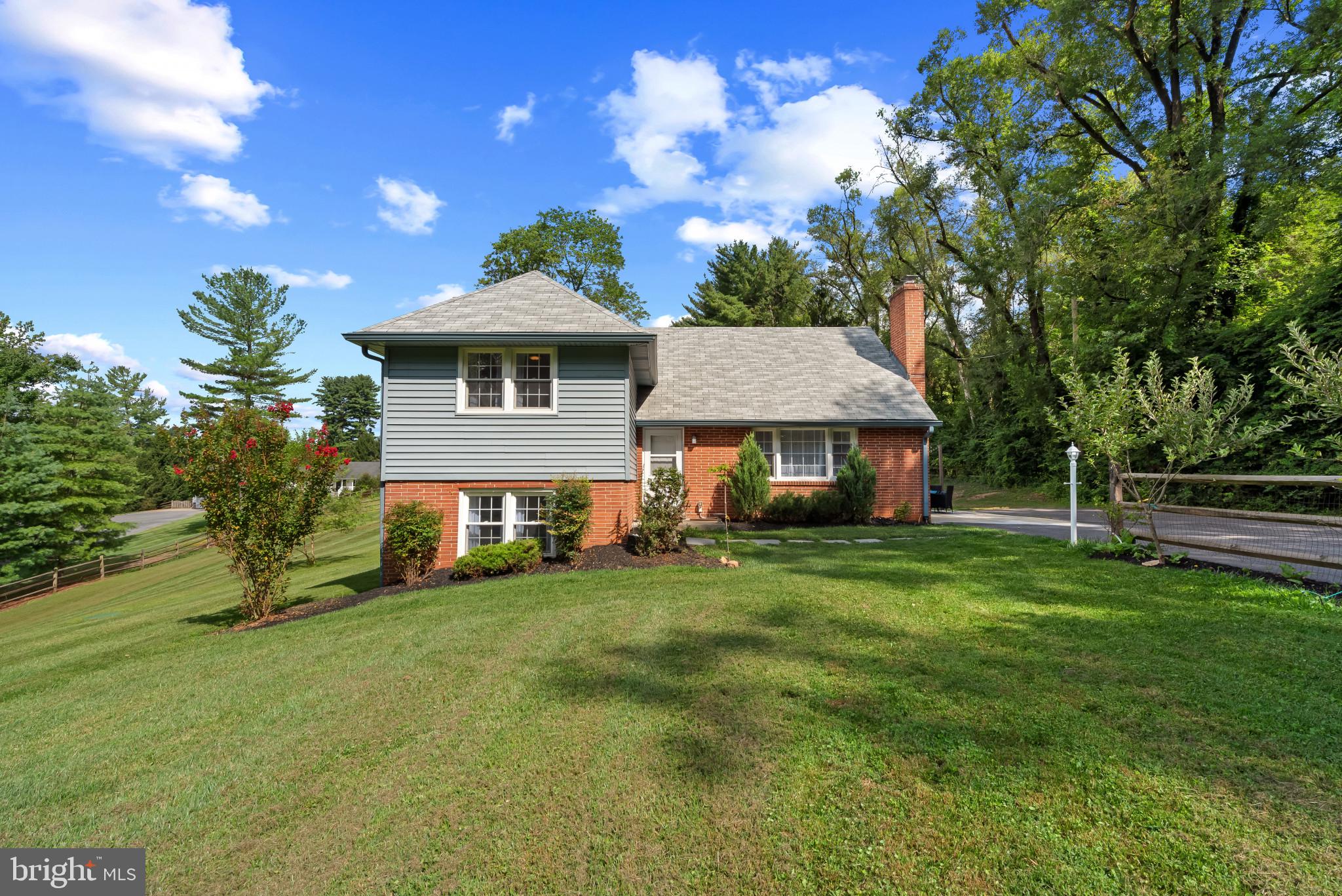 Welcome to 2.68 acres of tranquil countryside living. This contemporary home offers five levels across more than 3,000 sq. ft., with 4 bedrooms and 2 full bathrooms plus a bonus barn with electricity on the property.
The main level features a modern, luxury kitchen perfect for entertaining, while the living room offers a cozy natural wood-burning fireplace. Upstairs, you’ll find two bedrooms and a full bath, with the top level hosting a third bedroom complete with built-in storage.
On the lower level, enjoy a private fourth bedroom, an additional full bath, and a versatile bonus space—ideal for a home office, gym, or guest suite.
Designed for seamless indoor-outdoor living, the home includes a spacious patio off the kitchen, perfect for relaxing or hosting gatherings. Positioned in the center of the property, it offers exceptional peace and privacy. The fenced pasture and spacious barn—equipped with electricity—make it ideal for hobbies, storage, or a workshop.
Recent thoughtful updates include:
New carpeting (2025)
Whole-house painting (2025)
Updated water treatment system (2022)
Conveniently located near walking trails, Maple Lawn shopping and dining, and with easy access to Routes 32 and 29, this home offers the best of countryside living with city conveniences.